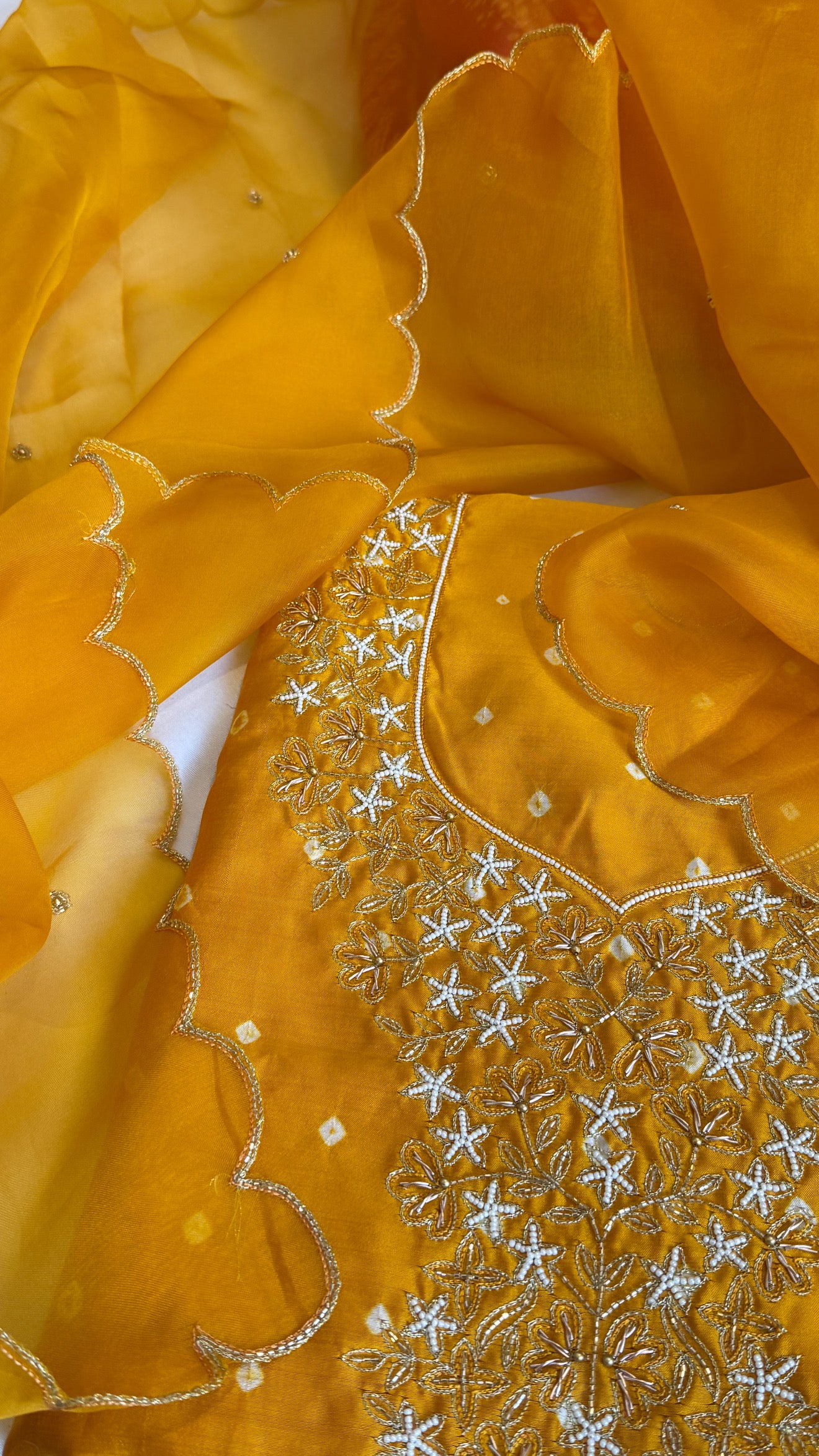 Haldi yellow raw mango bandhej hand embroidered kadhwa suit set