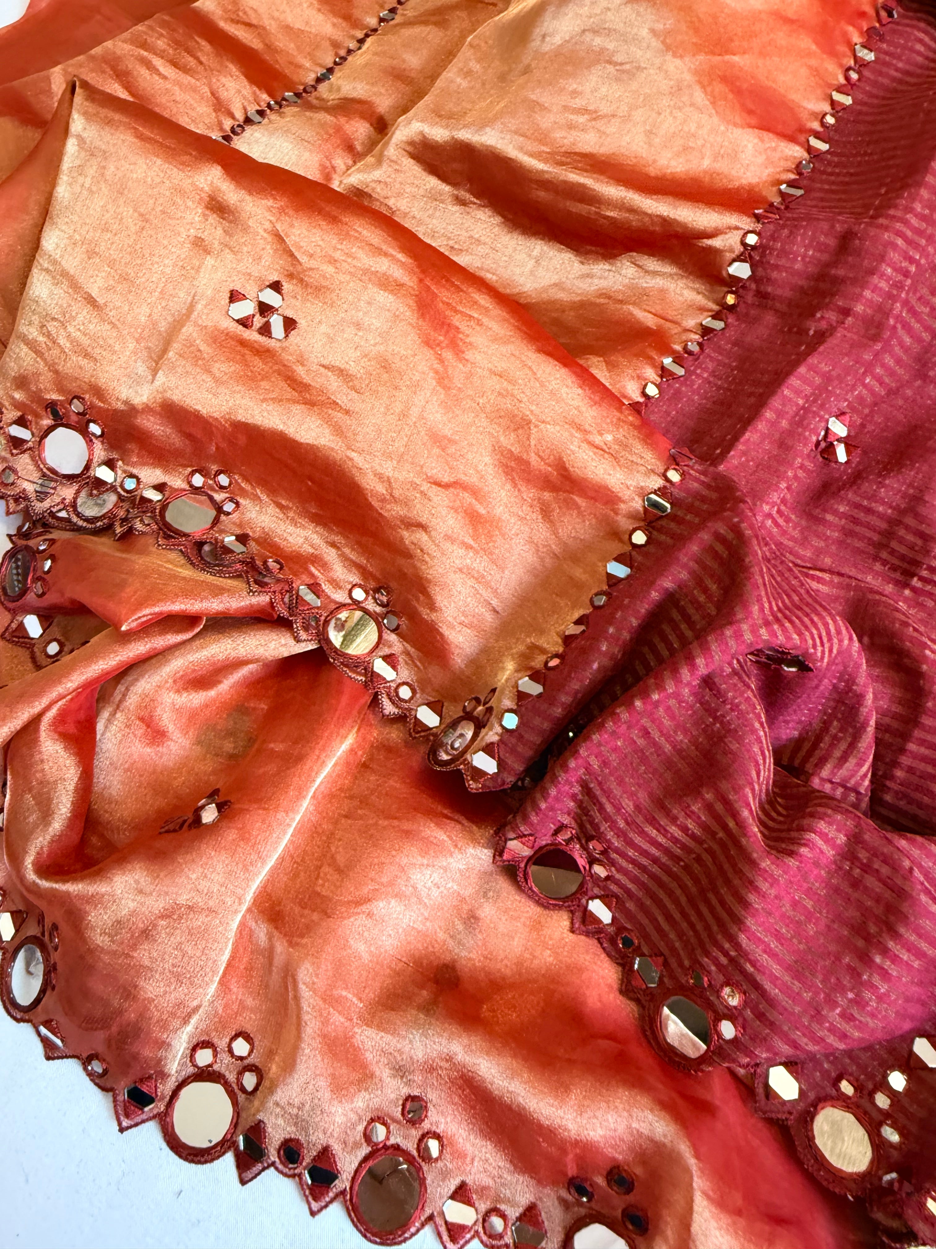 Rustic red half striped-half tissue mirror work hand embroidered kadhwa saree