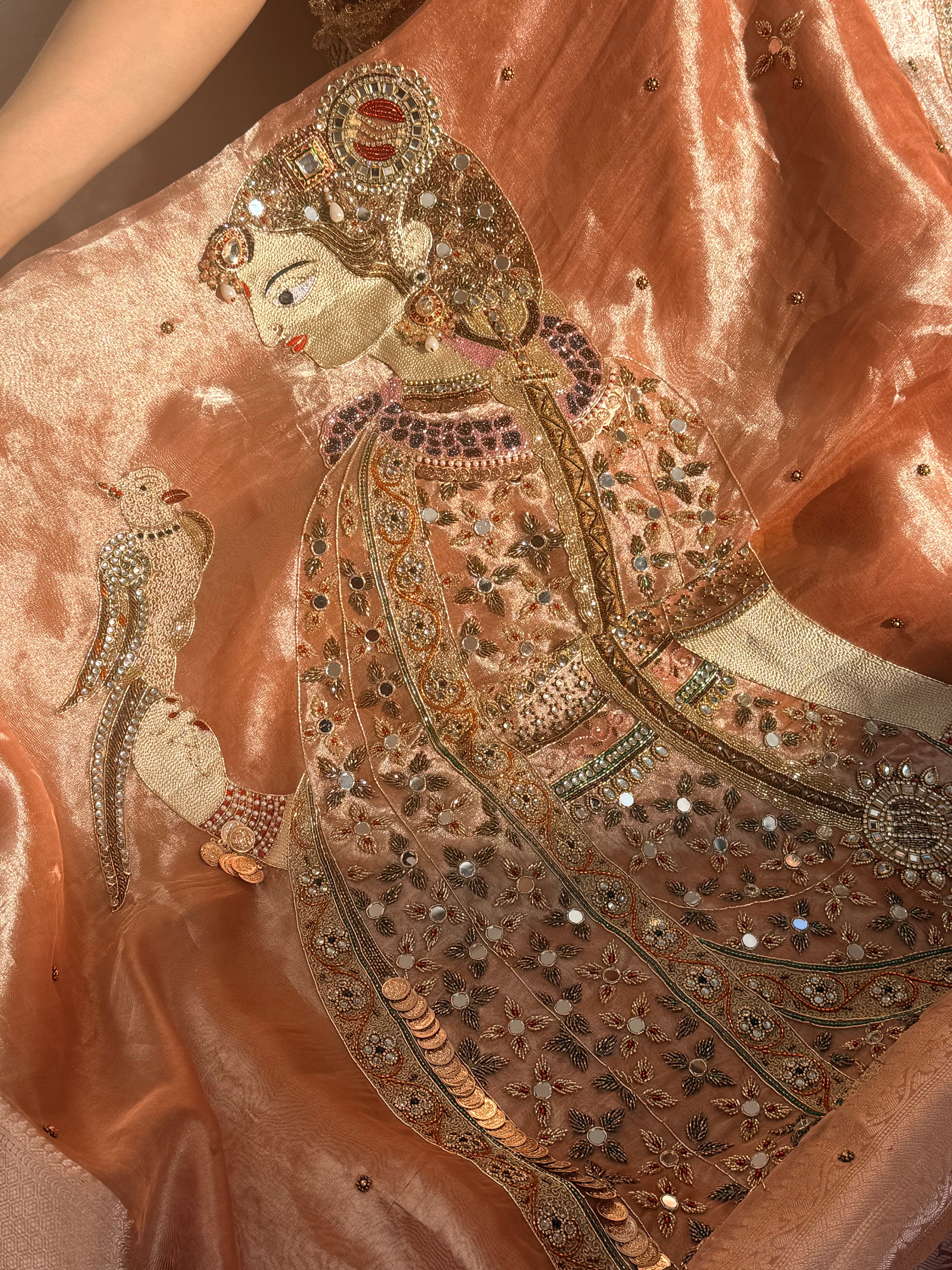 Heer saree with jadau necklace work hand embroidered tissue silk gajri peach saree