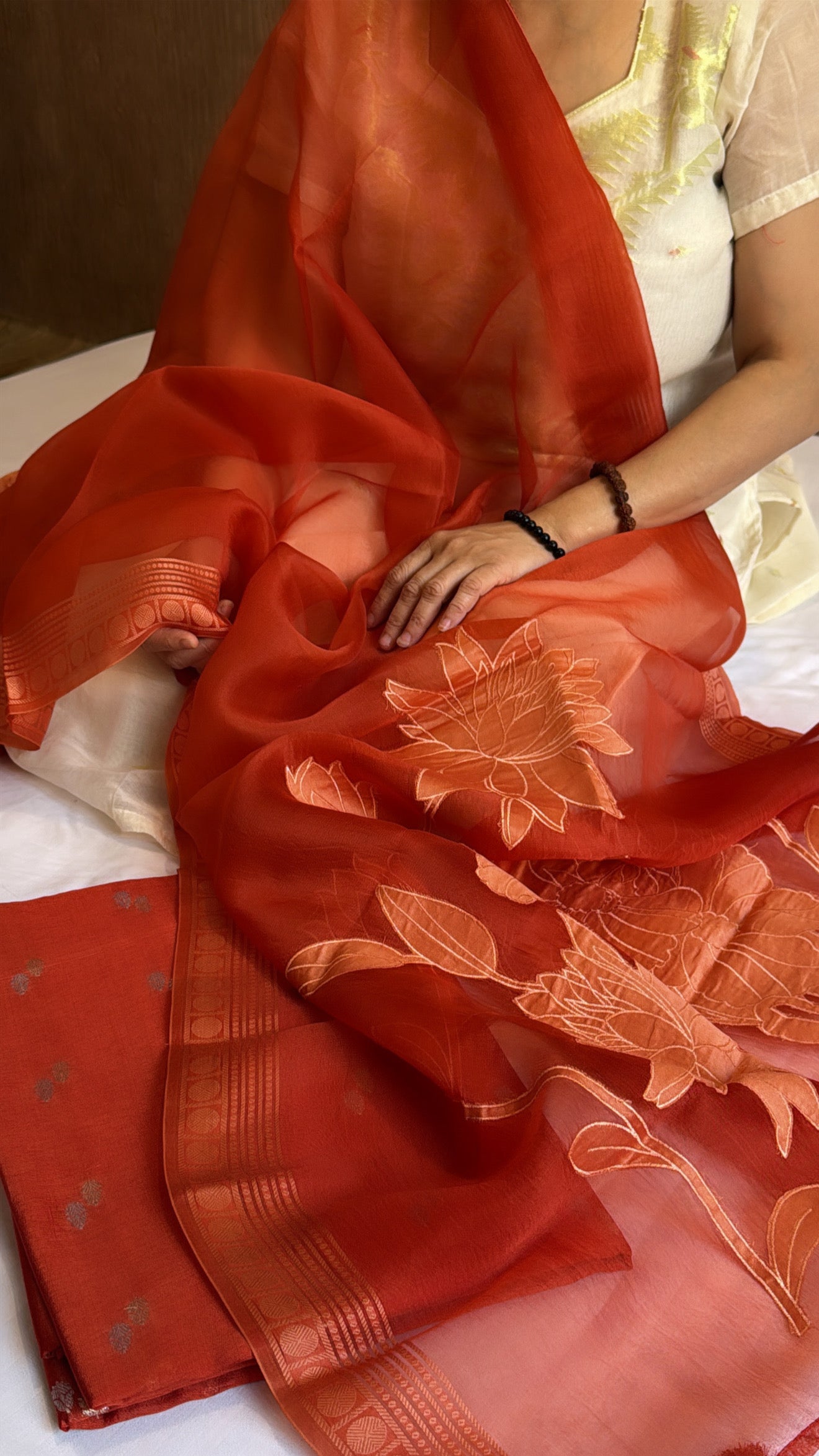 Rustic fanta orange kora silk appliqué work duppata paired with chiniya silk kurta set