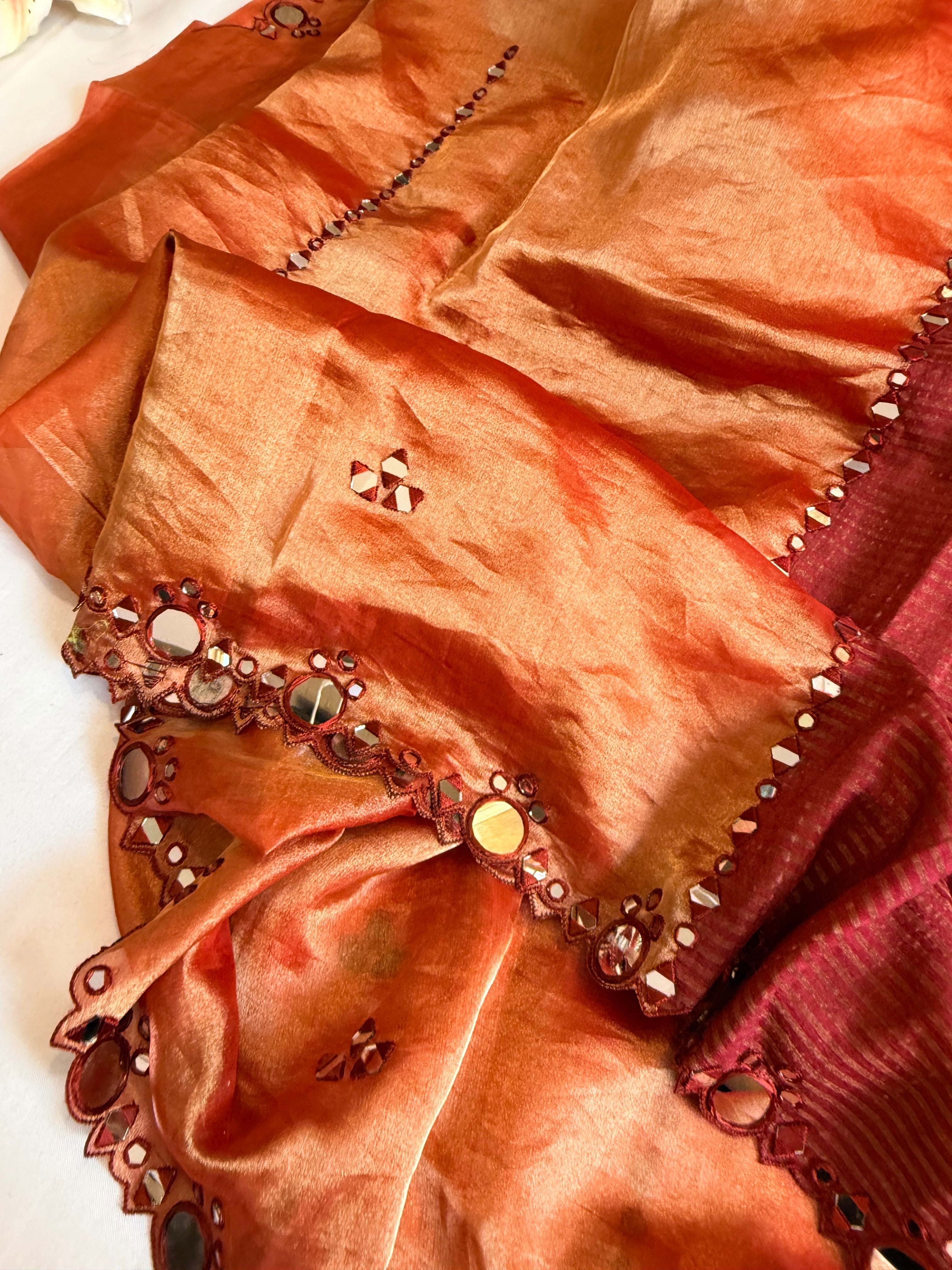 Rustic red half striped-half tissue mirror work hand embroidered kadhwa saree