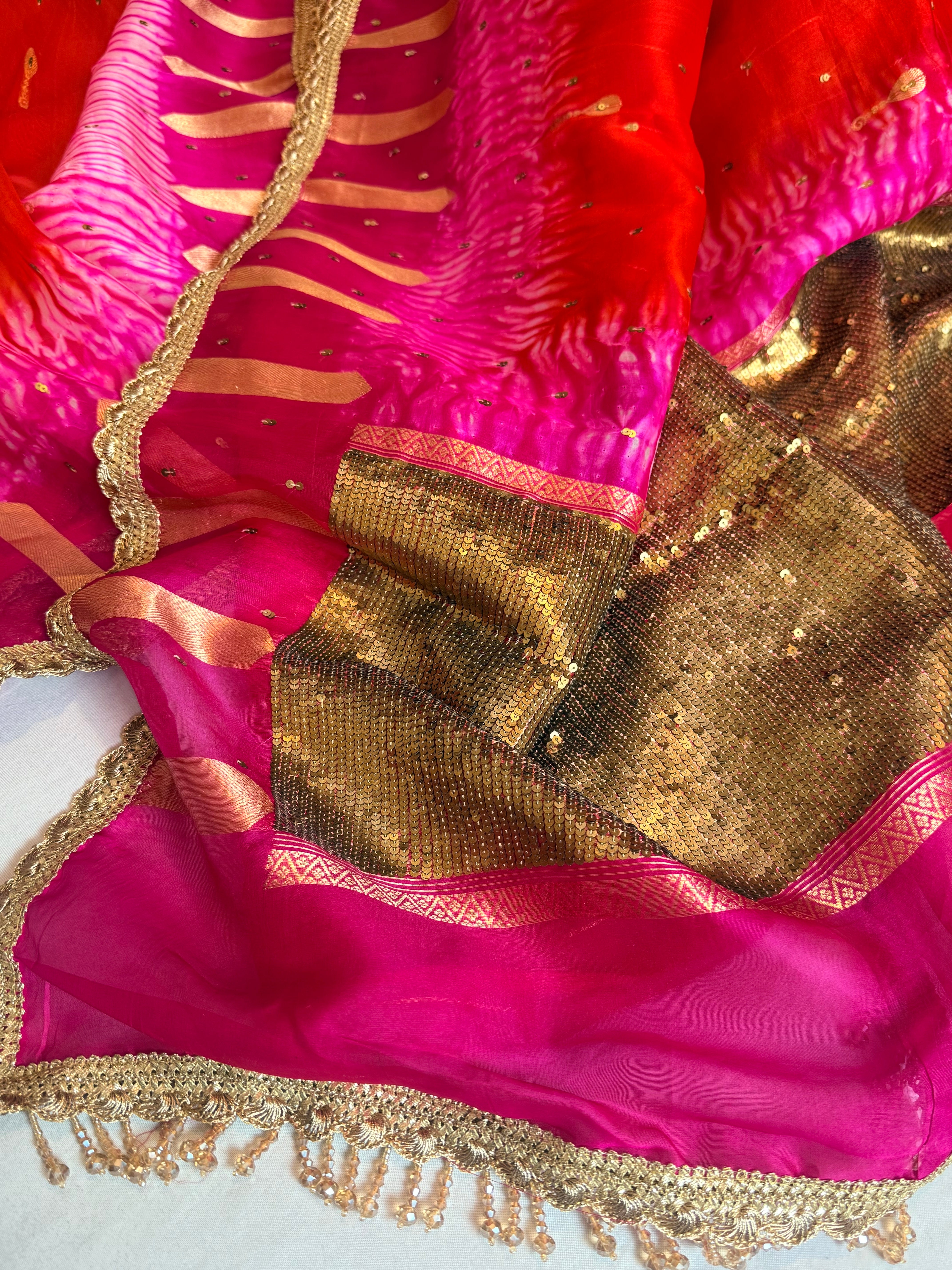 Shibori dye kora silk salma sitara work hand embroidered sequins saree