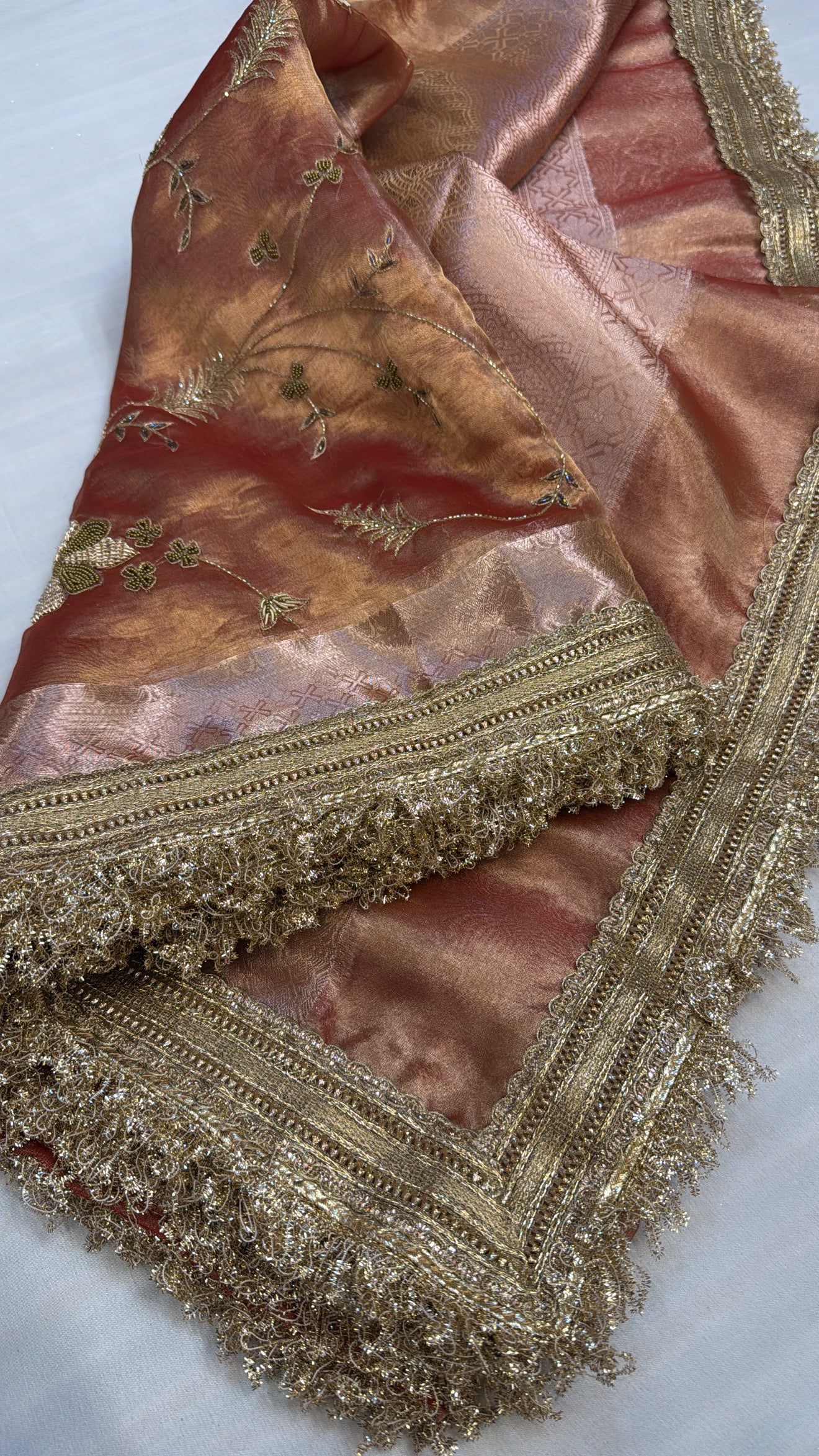 Husn tangerine red tissue silk hand embroidered saree