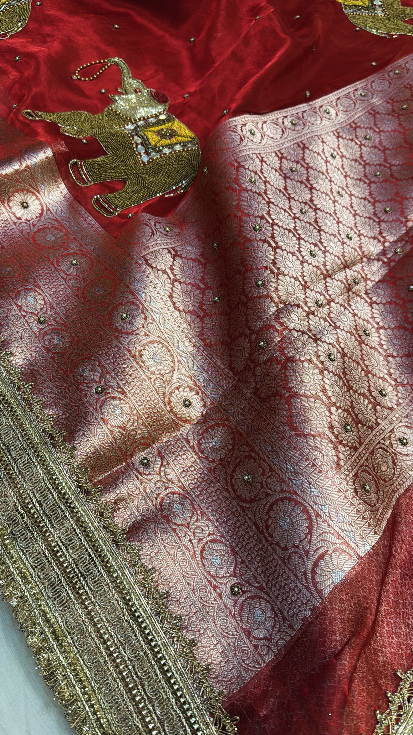 Red special - Husn hot red tissue silk elephant motif hand embroidered saree