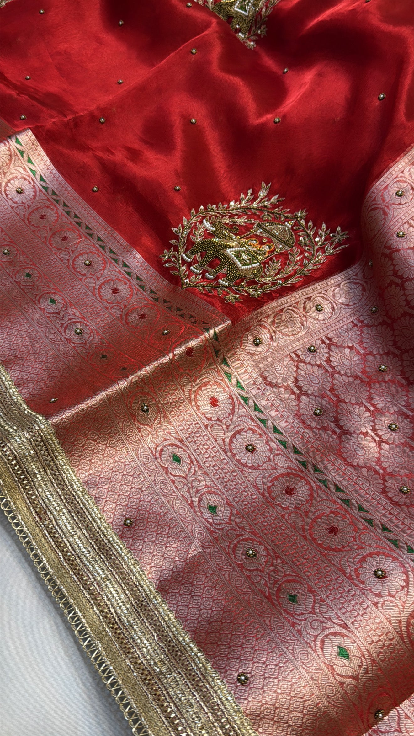 Dulhan ka joda husn red tissue silk hand embroidered saree