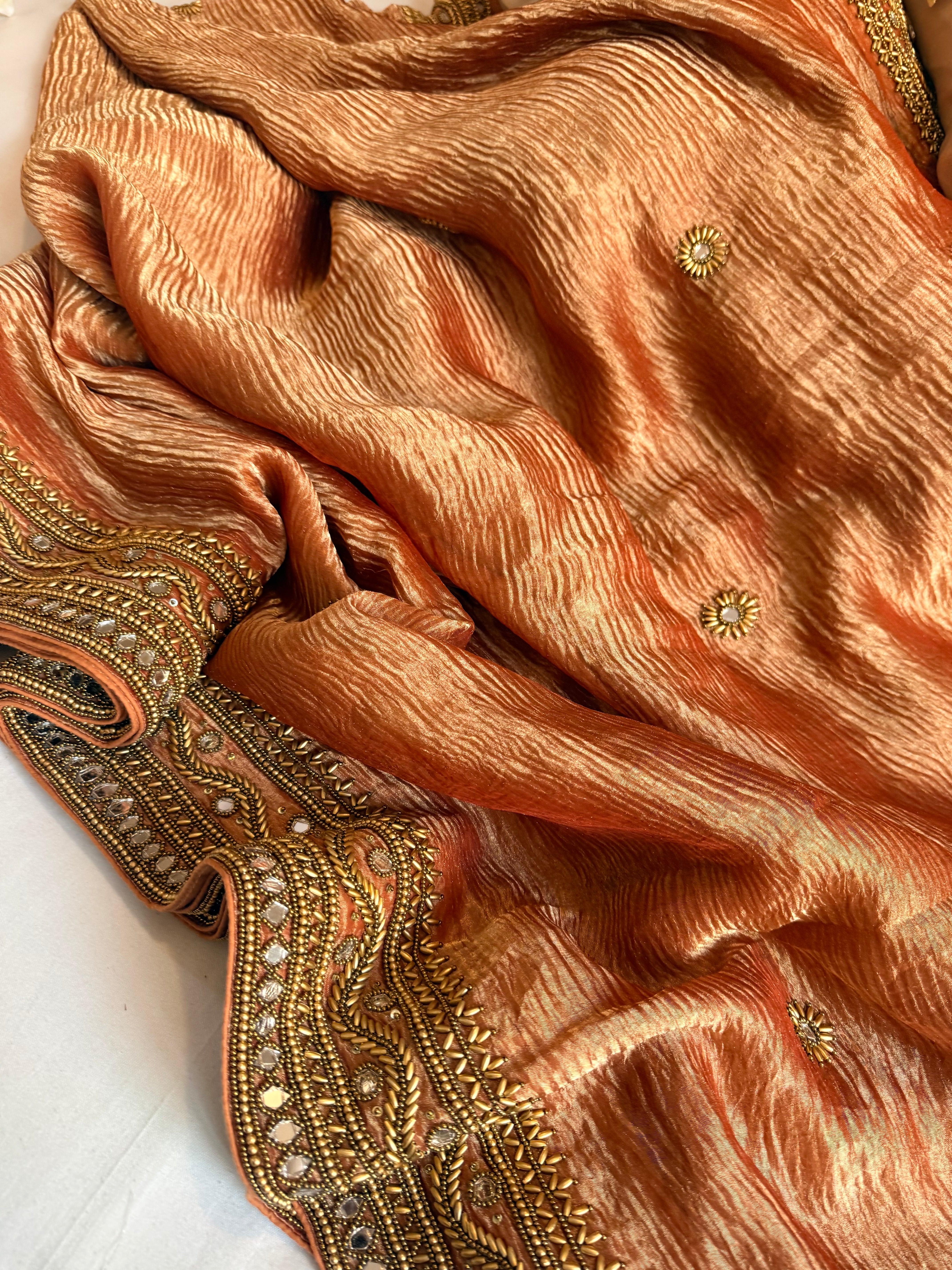 Rajkumari gajri crushed tissue silk hand embroidered kadhwa saree