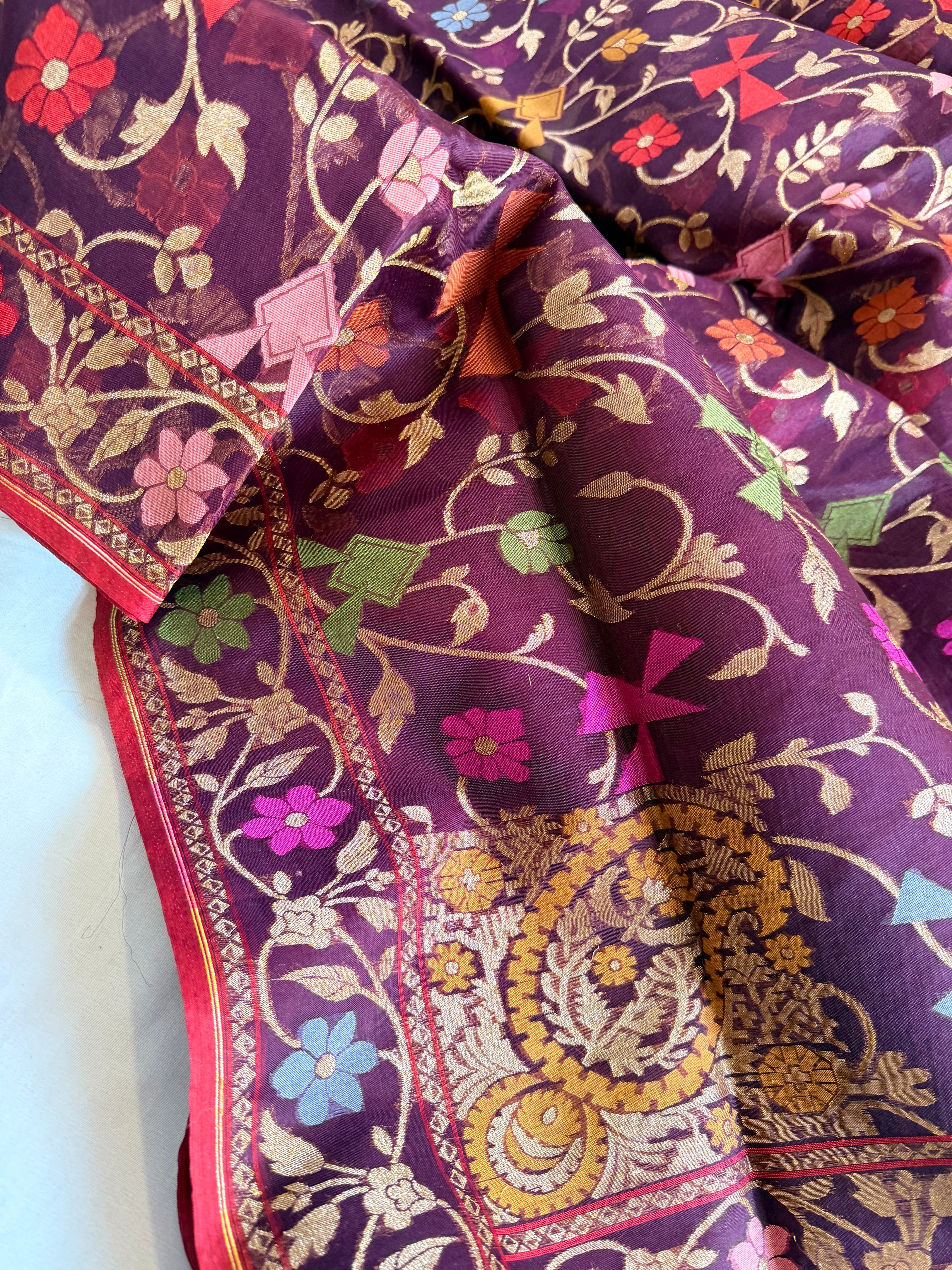 Banarasi kora silk net plum purple iktara jamdani kadhwa saree
