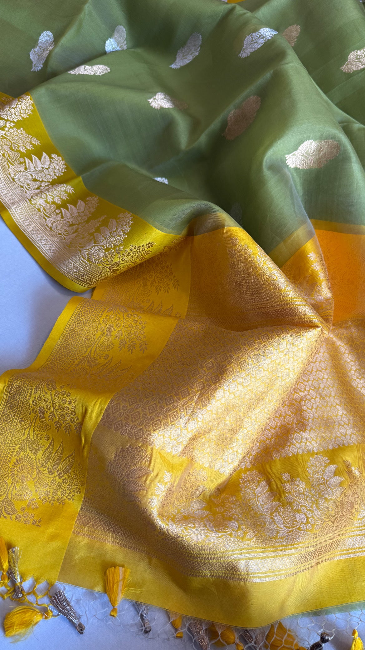 Parrot green-yellow kora silk banarasi border kadhwa saree