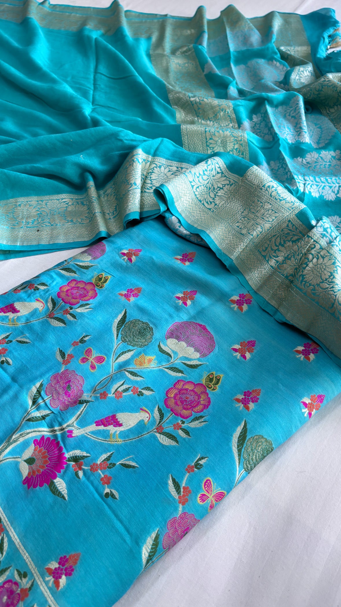 Firozi blue moonga silk meenakari kurta paired with gorgette duppata suit set