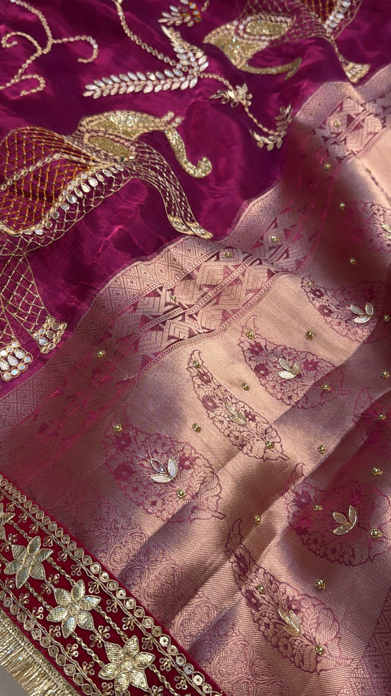 Rani pink husn tissue silk elephant motif hand embroidered saree