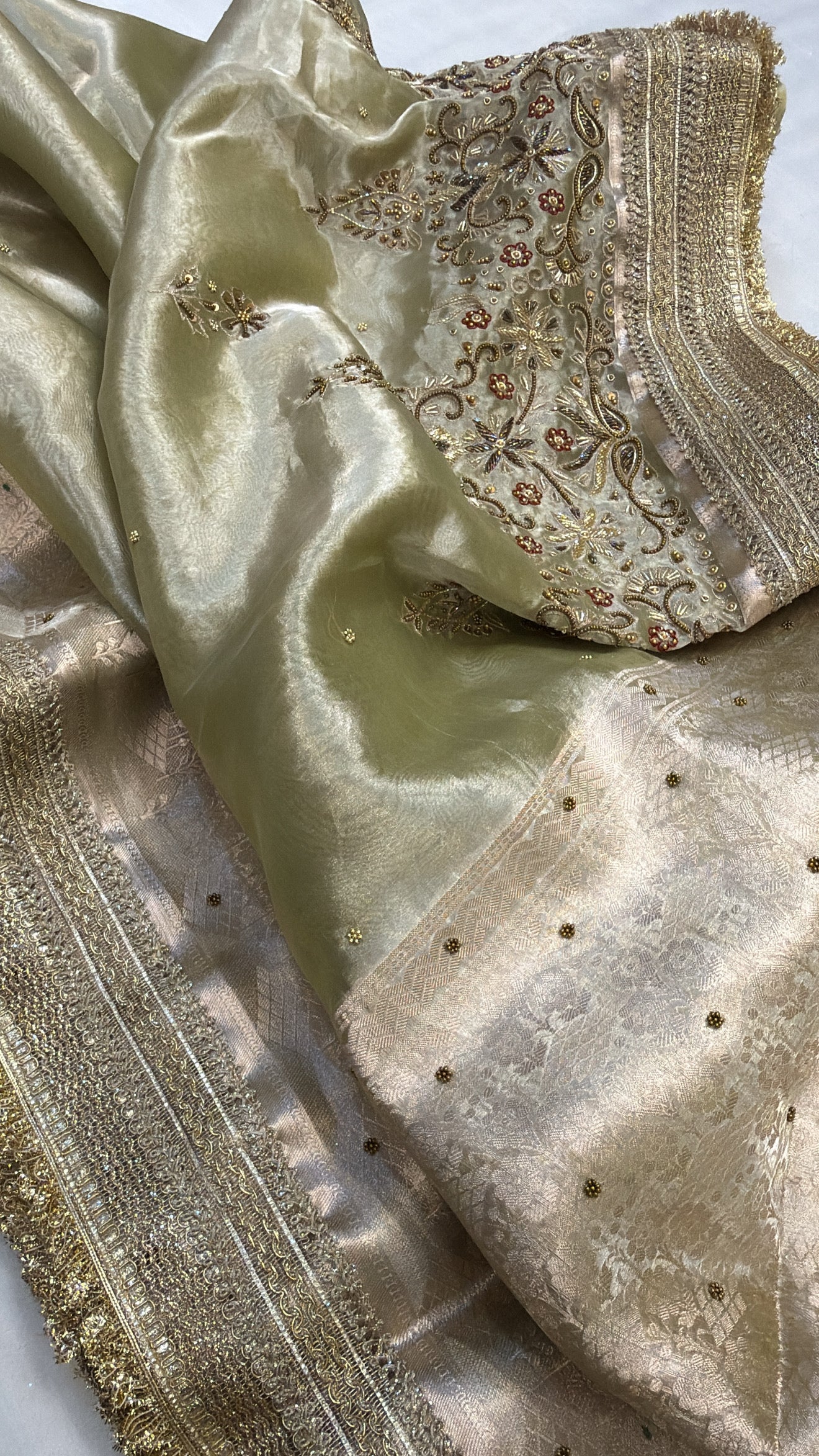 Shiny green tissue silk hand embroidered zardozi work kadhwa saree