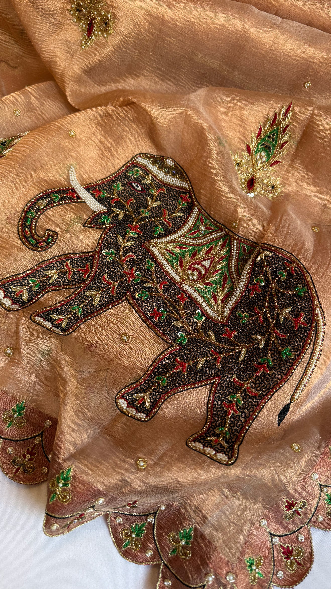 GajGamini copper crushed tissue silk elephant motif heavy hand embroidered saree