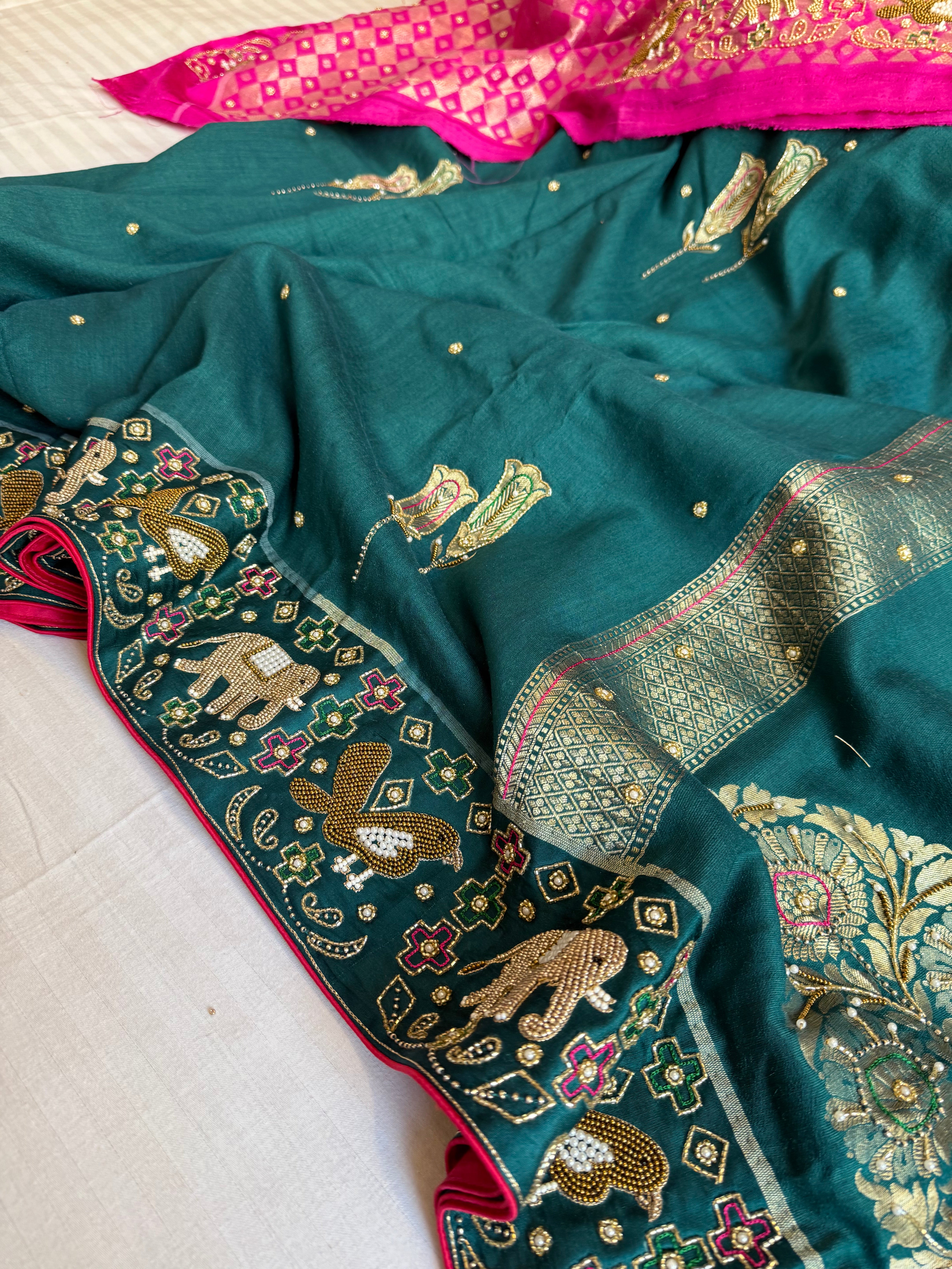Moonga silk ikkat patola weaving inspired hand embroidered kadhwa saree