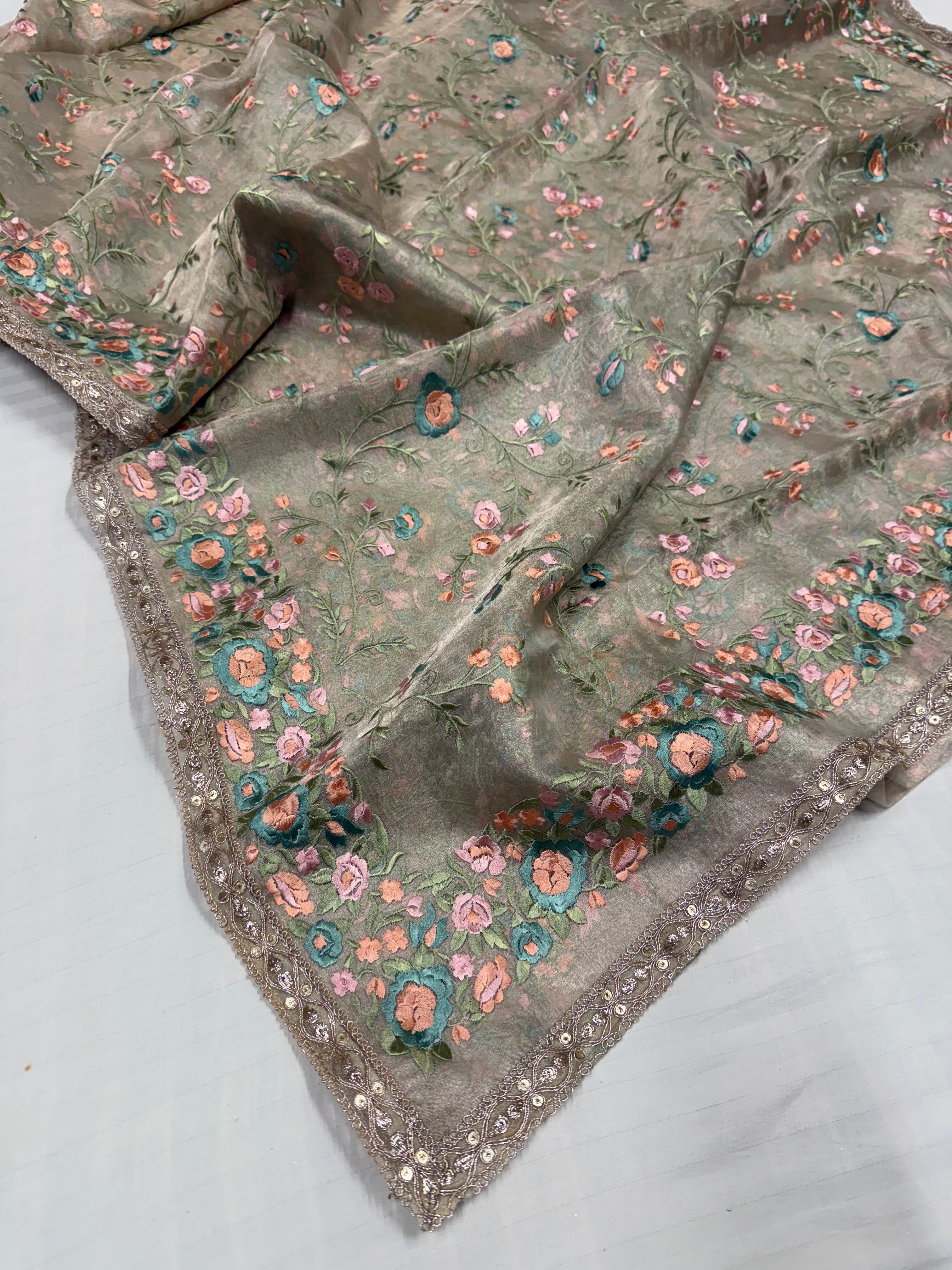 “Parsi gara” inspired tissue silk heavy resham work hand embroidered saree