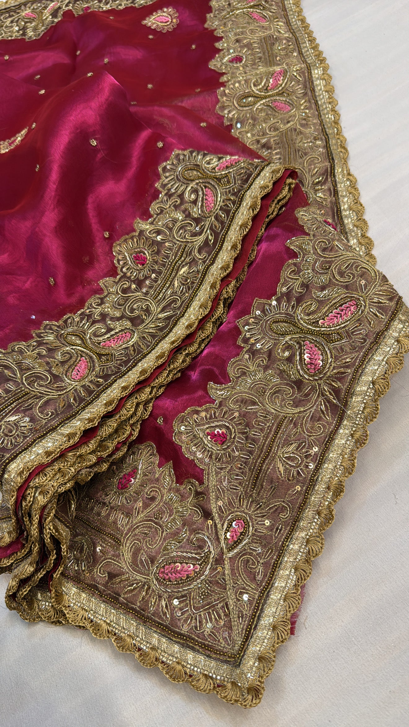 Husn metallic pink heavy zardozi border tissue silk hand embroidered saree