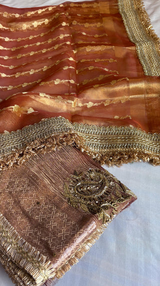 Husn tissue silk saree                     Maharani tissue silk is optional to add (Tick the box below and add to cart to add maharani duppata)