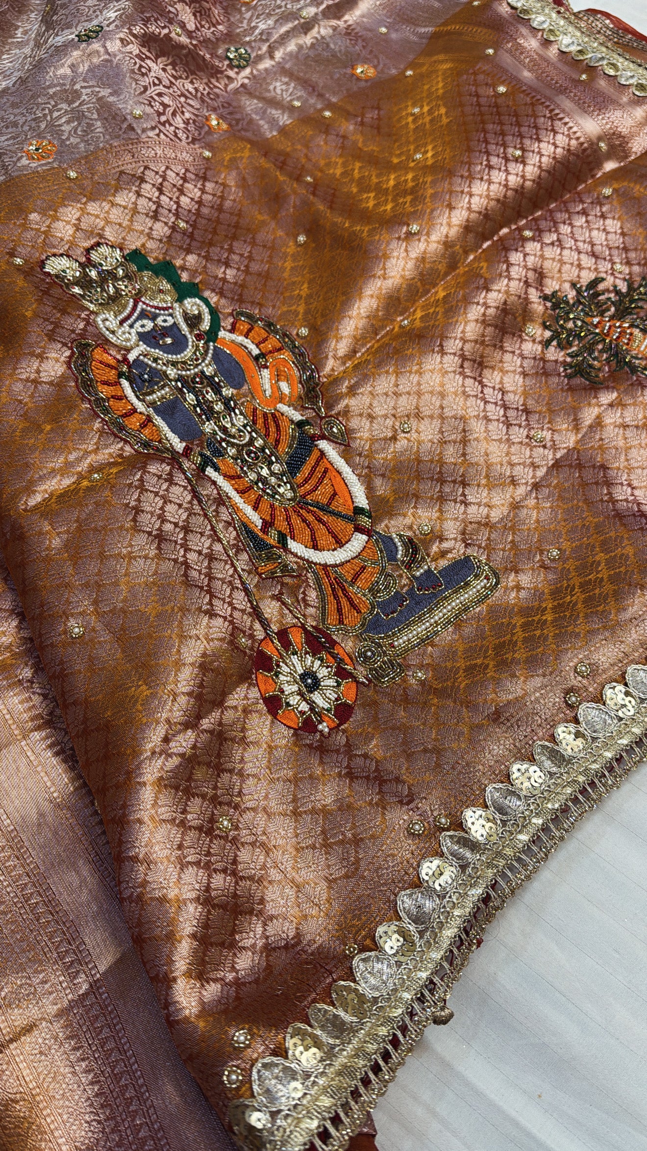 Wedding edit - Husn Soft orange tissue silk brocade shreenathji motif hand embroidered saree