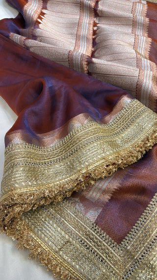 Maharani metallic maroonish-purple dhup chao effect tissue silk saree