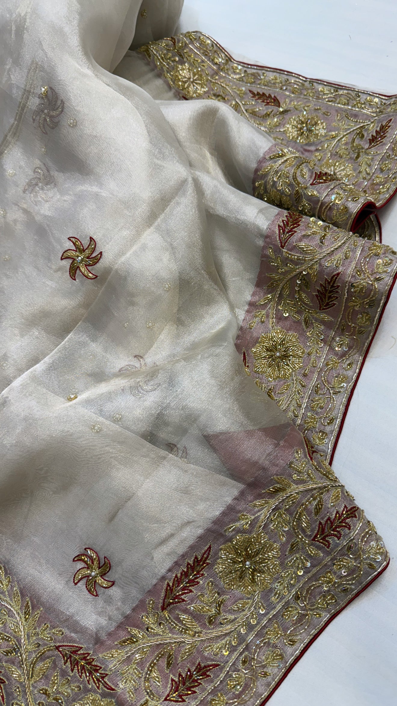 Gulab ki pankhuri husn tissue silk heavy hand embroidered zardozi border saree