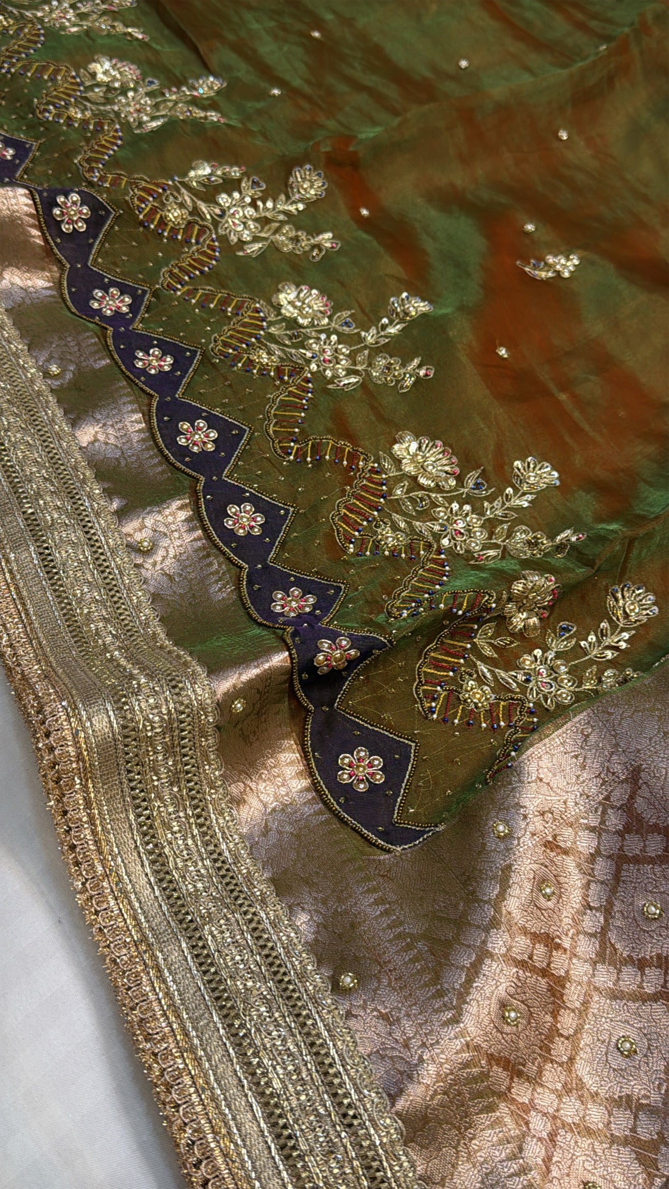 Mehendi green dhup chao effect tissue silk hand embroidered saree