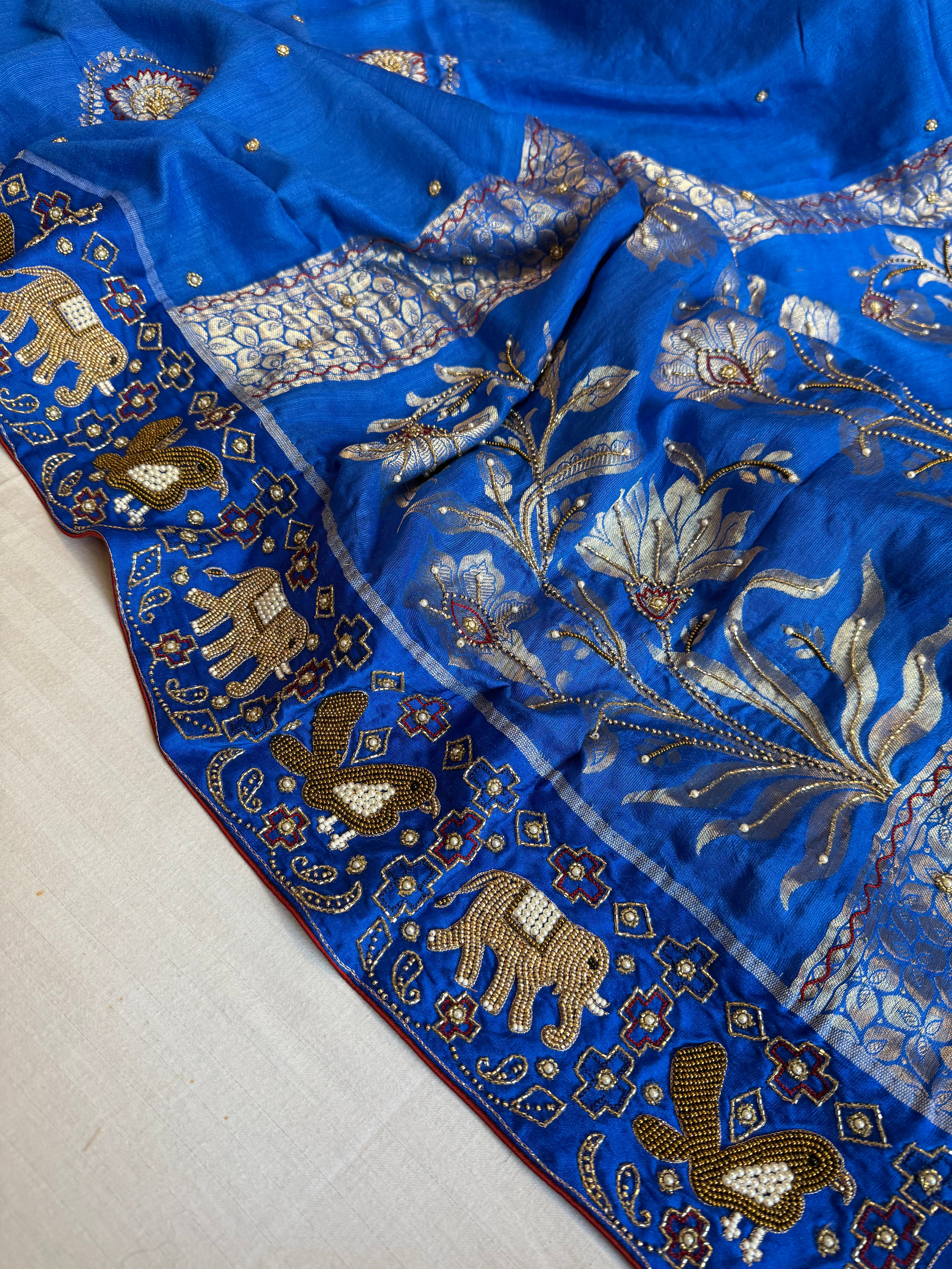 Moonga silk inspired ikkat patola inspired hand embroidered kadhwa saree