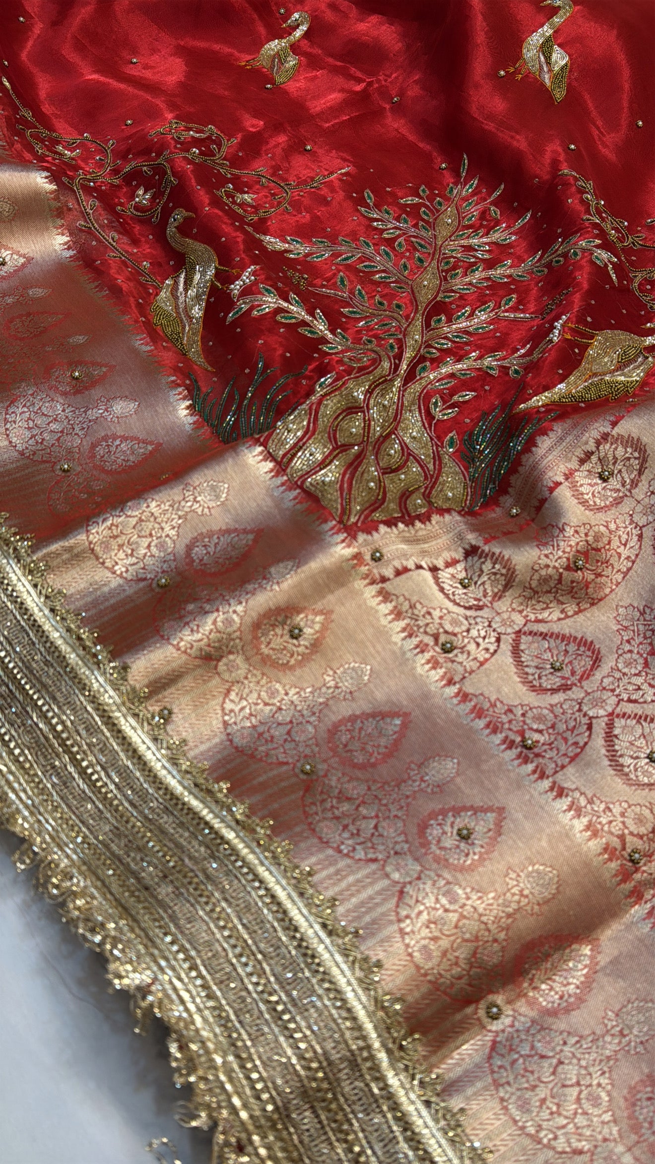 Dulhan ka joda husn red tissue silk hand embroidered saree