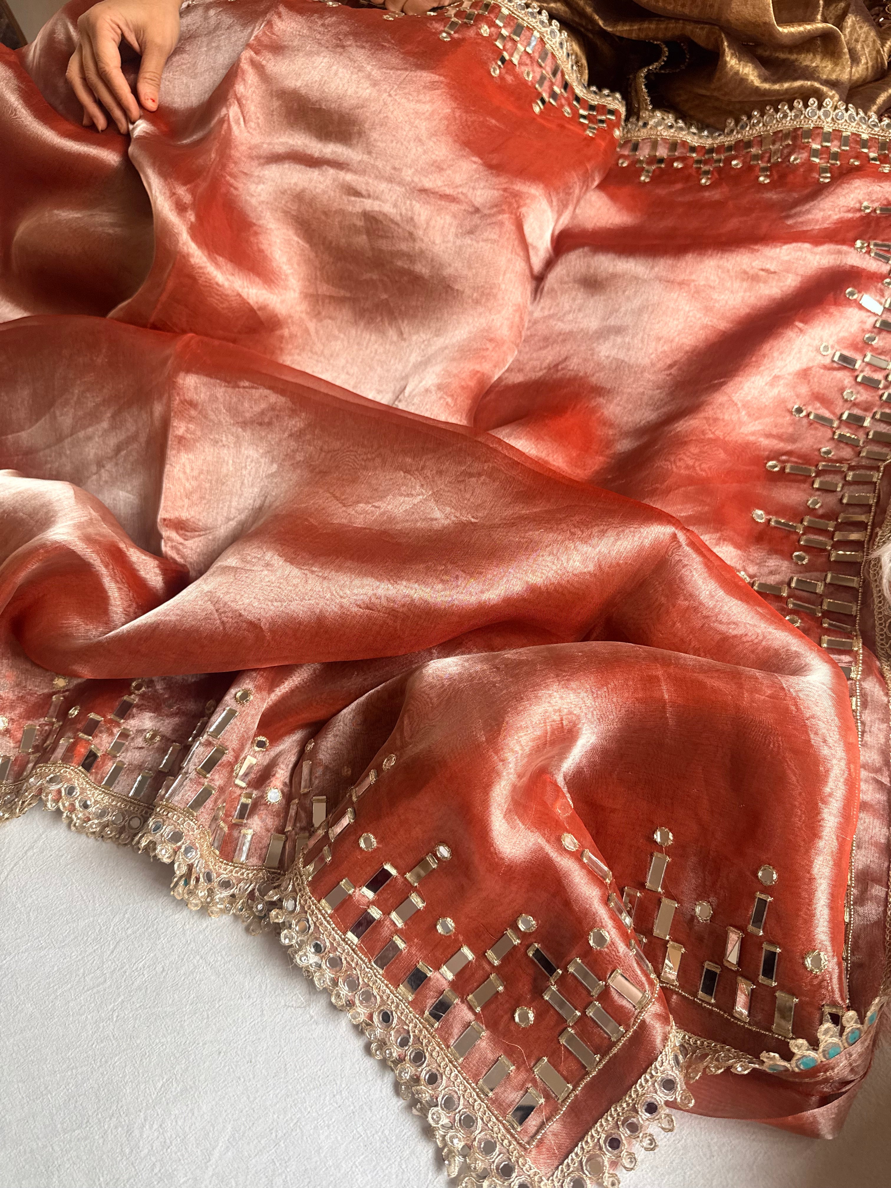 Gajri peach tissue silk mirrorwork hand embroidered kadhwa saree