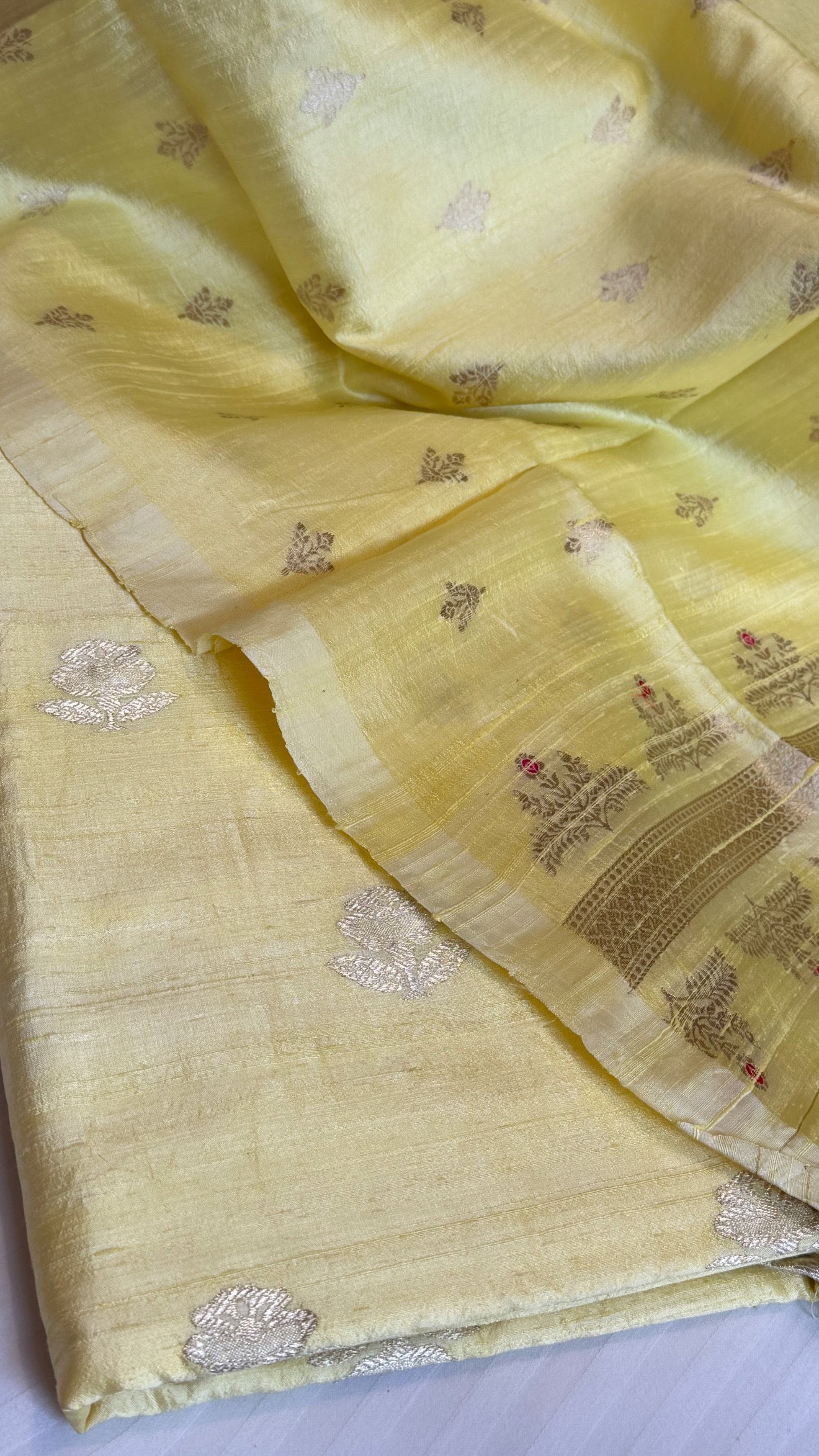Lime yellow kadhwa raw silk meenakari banarasi suit sets