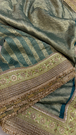 Moonga crushed tissue silk bottle green saree