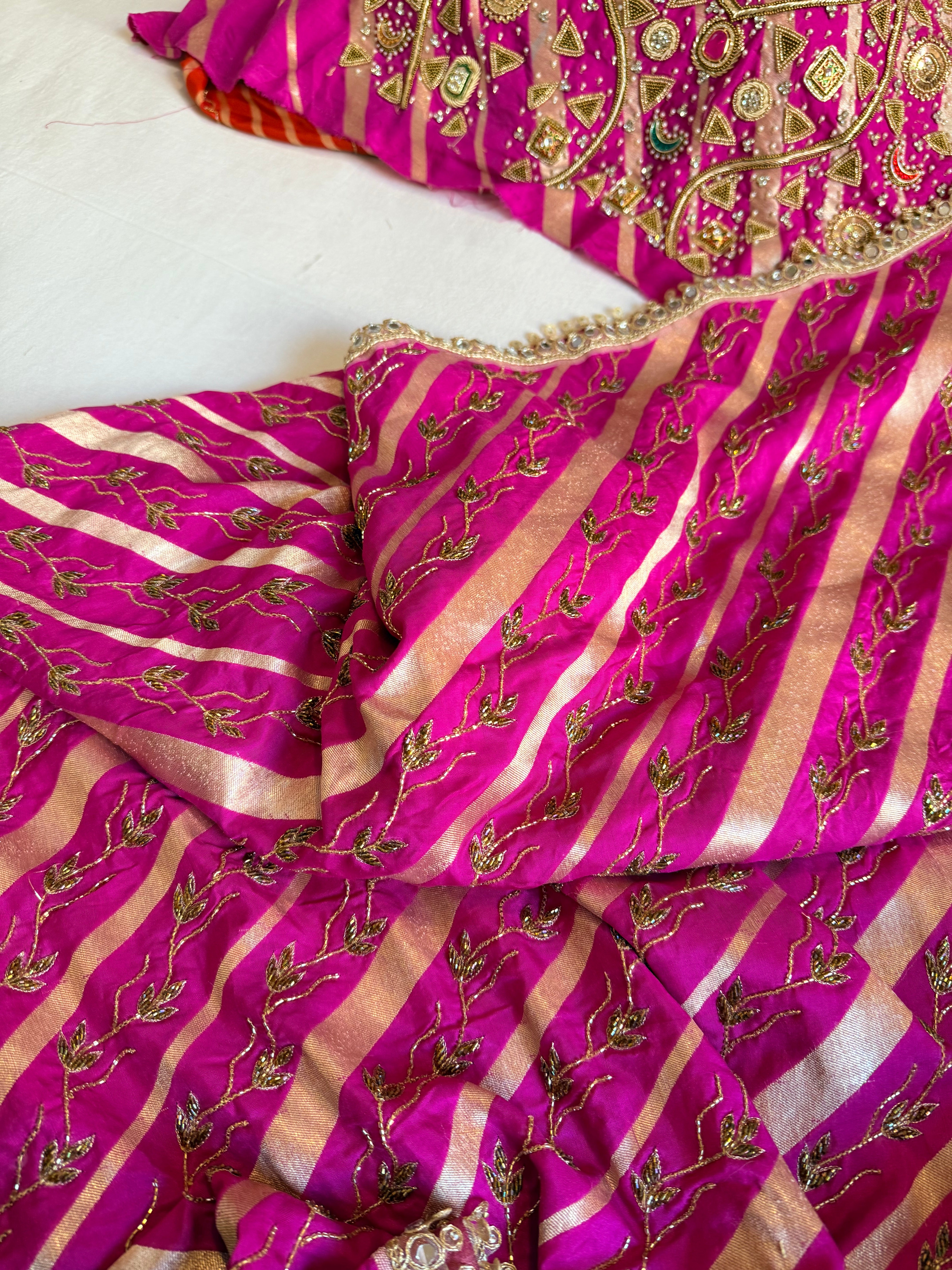 Mashru silk hot pink leheriya hand embroidered saree with bejewelled blouse
