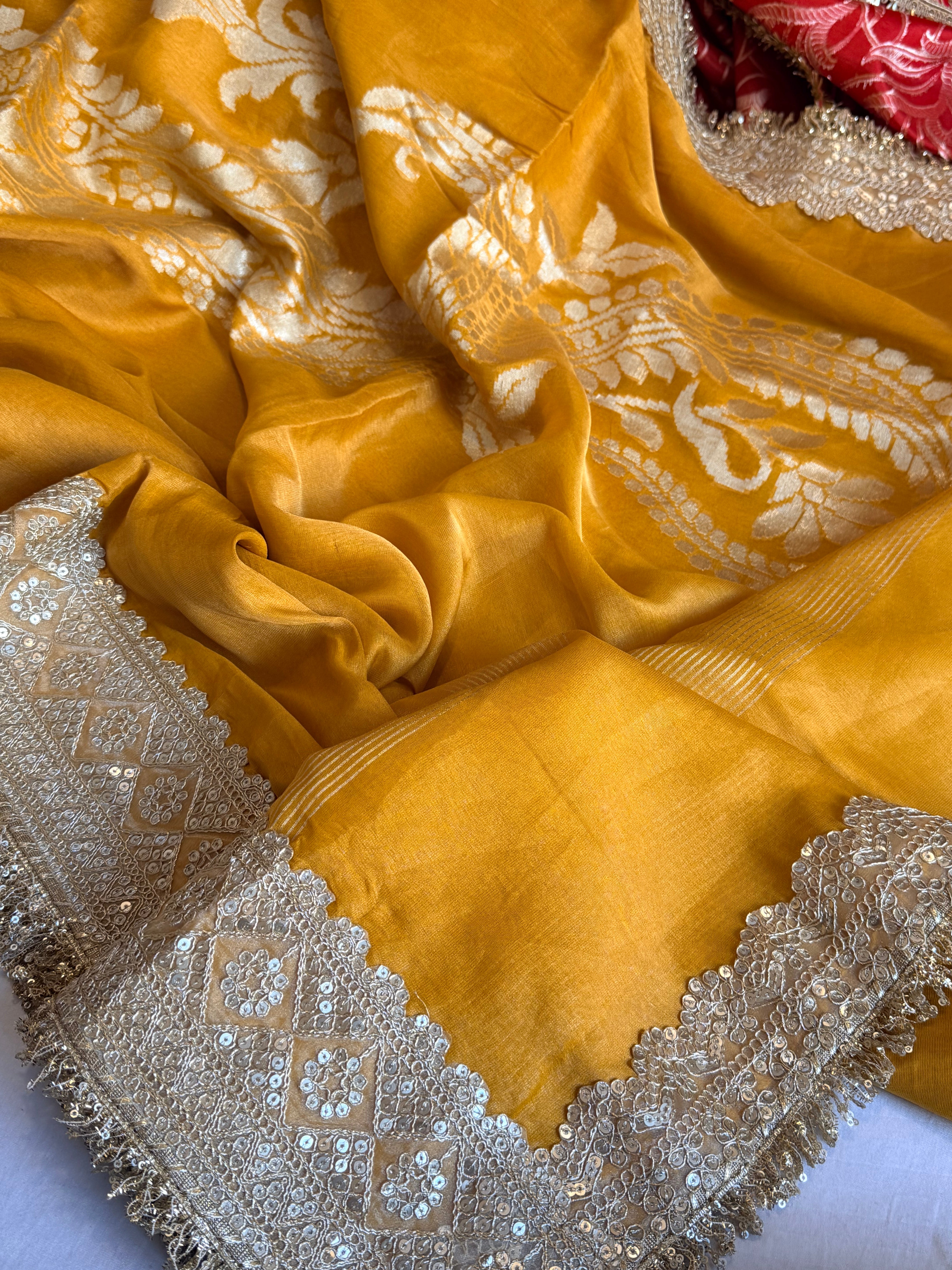 Haldi yellow tissue gorgette kadhwa motif saree