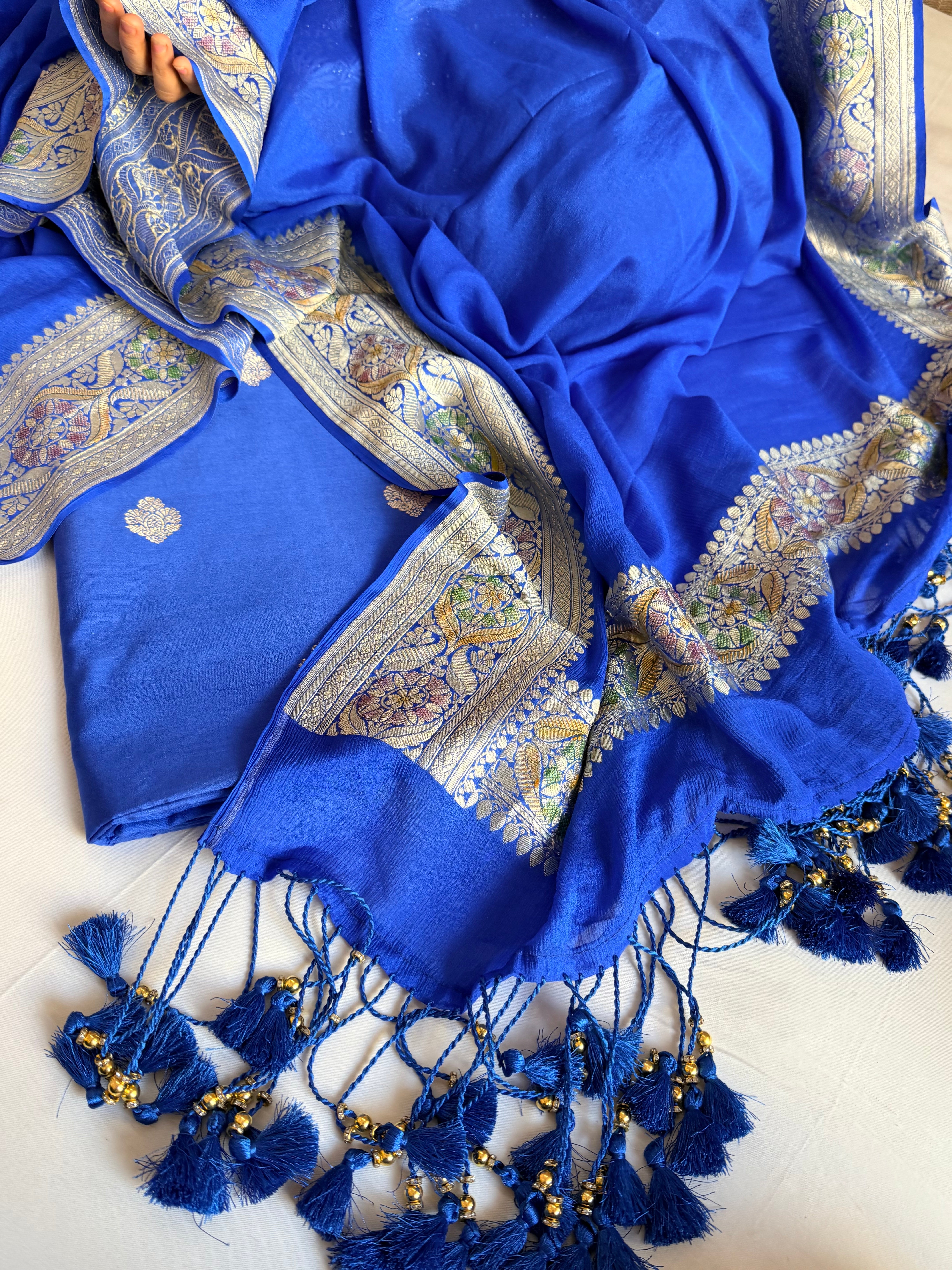 Moonga silk kadhwa kurta paired with gorgette duppata with latkans