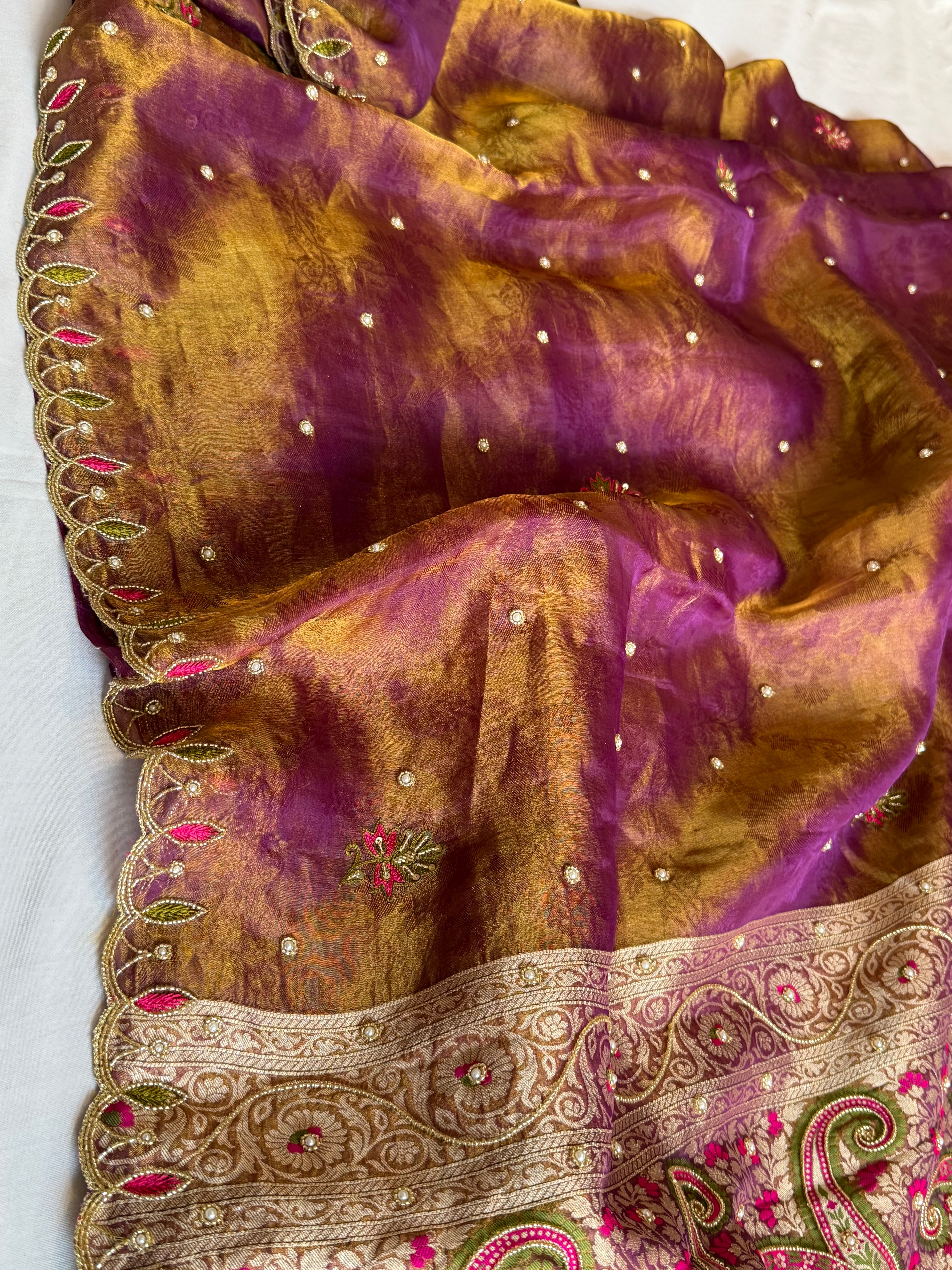 Copperish purple dhup chao effect tissue tanchoi jamevar meenakari pallu hand embroidered saree