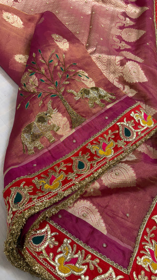 Husn shikargah edit rani pink tissue silk hand embroidered elephant motif saree