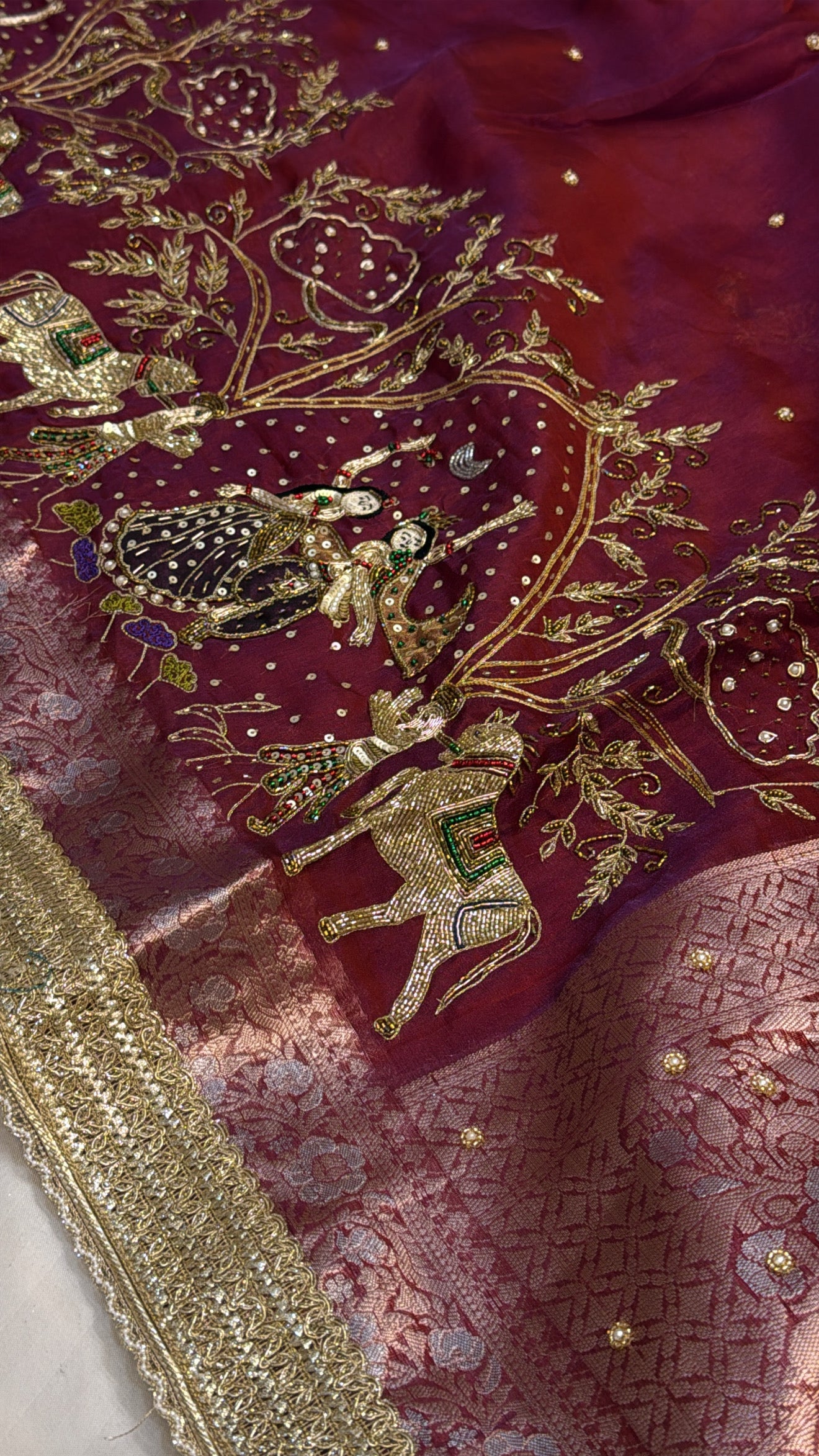 Maroonish dhup chao red tissue silk hand embroidered kadhwa rasleela saree