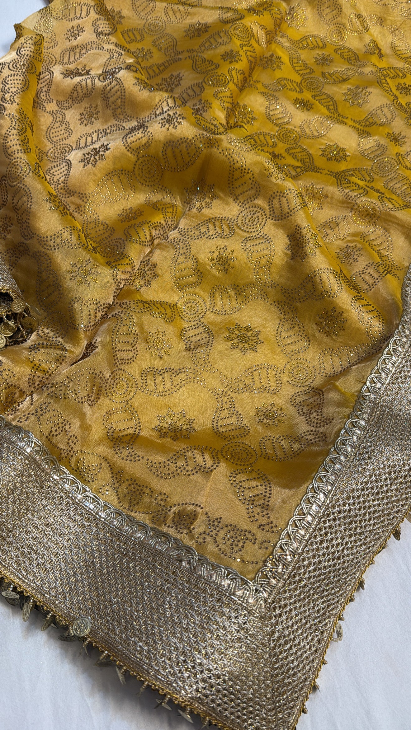 Maharani sitara stonework haldi yellow tissue silk kadhwa saree