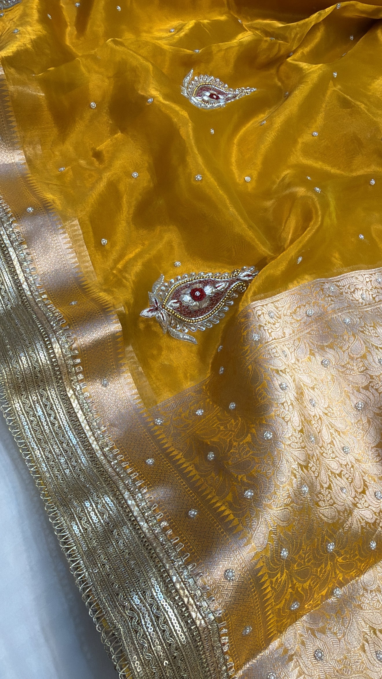 Kanjivaram haldi gold tissue silk hand embroidered meenakari buti kadhwa saree
