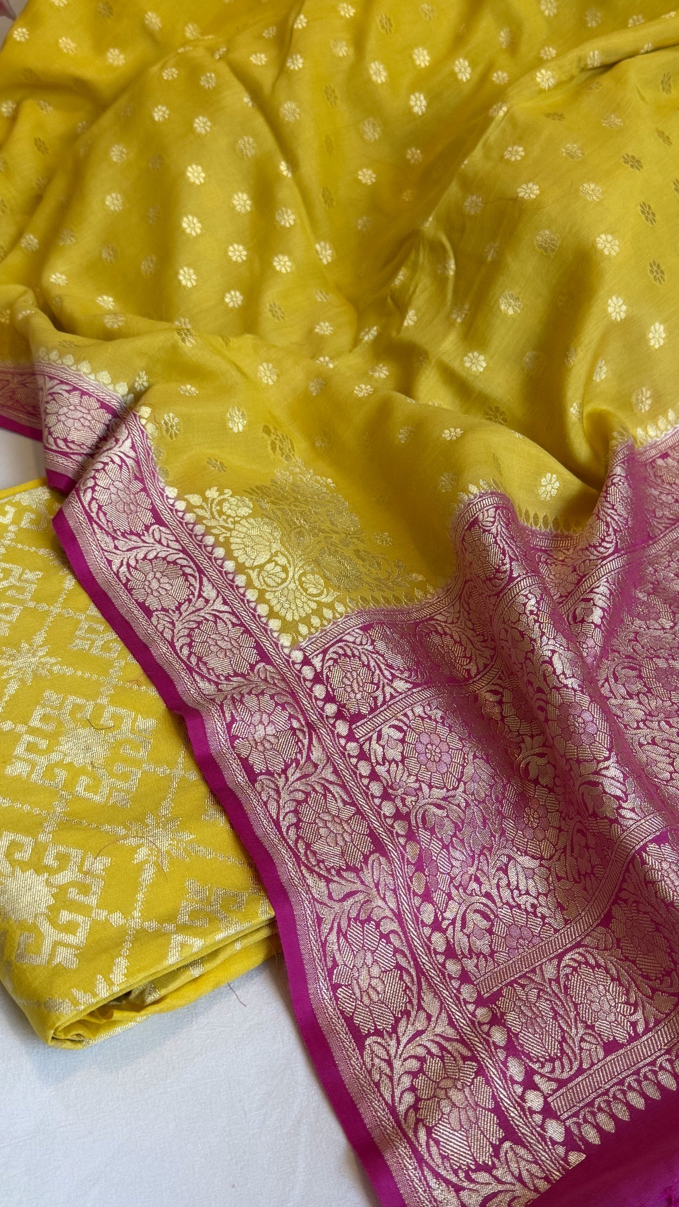 Banarasi haldi yellow - Rani pink chiniya silk kurta paired with moonga silk duppata set