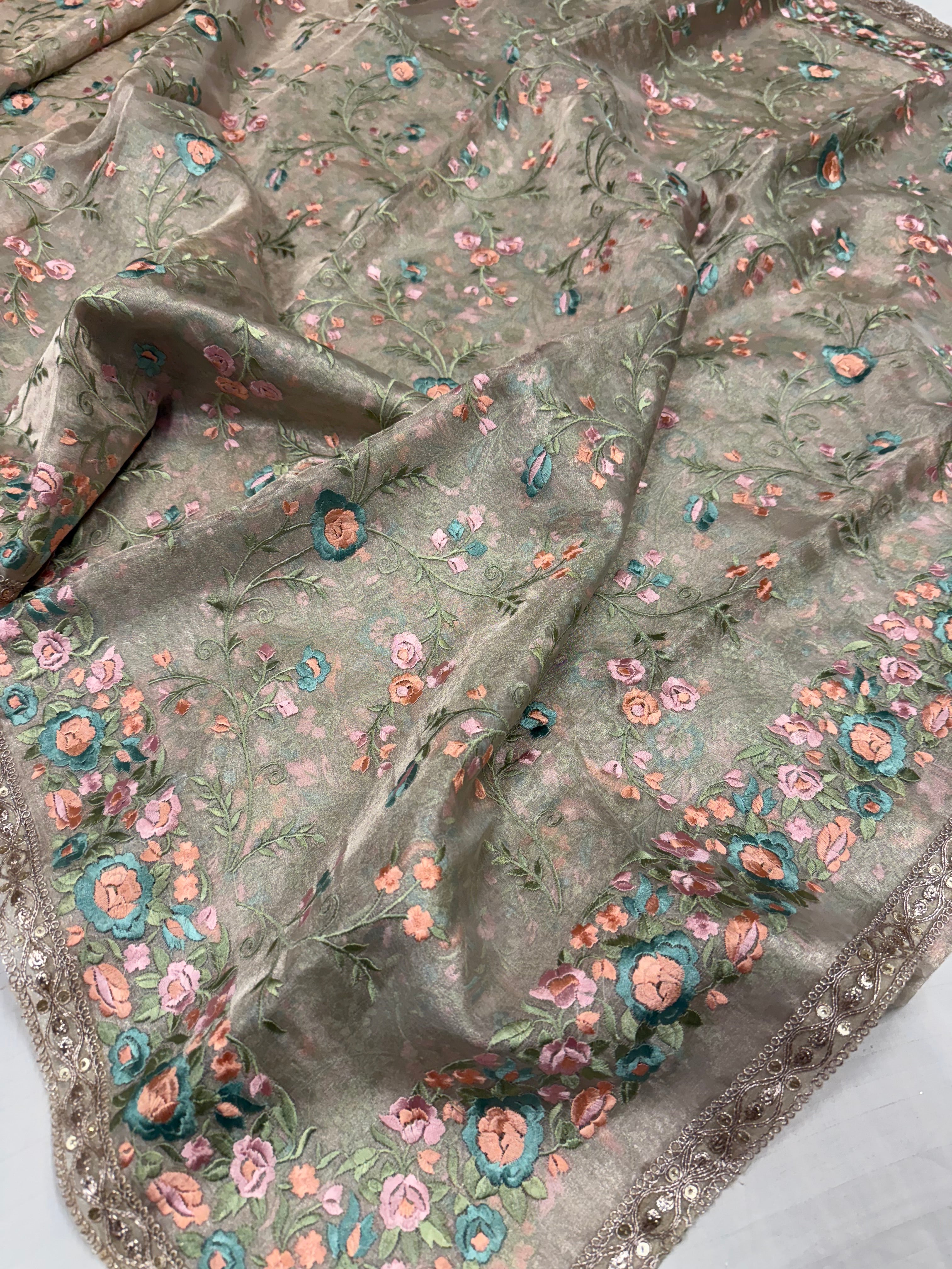 “Parsi gara” inspired tissue silk heavy resham work hand embroidered saree