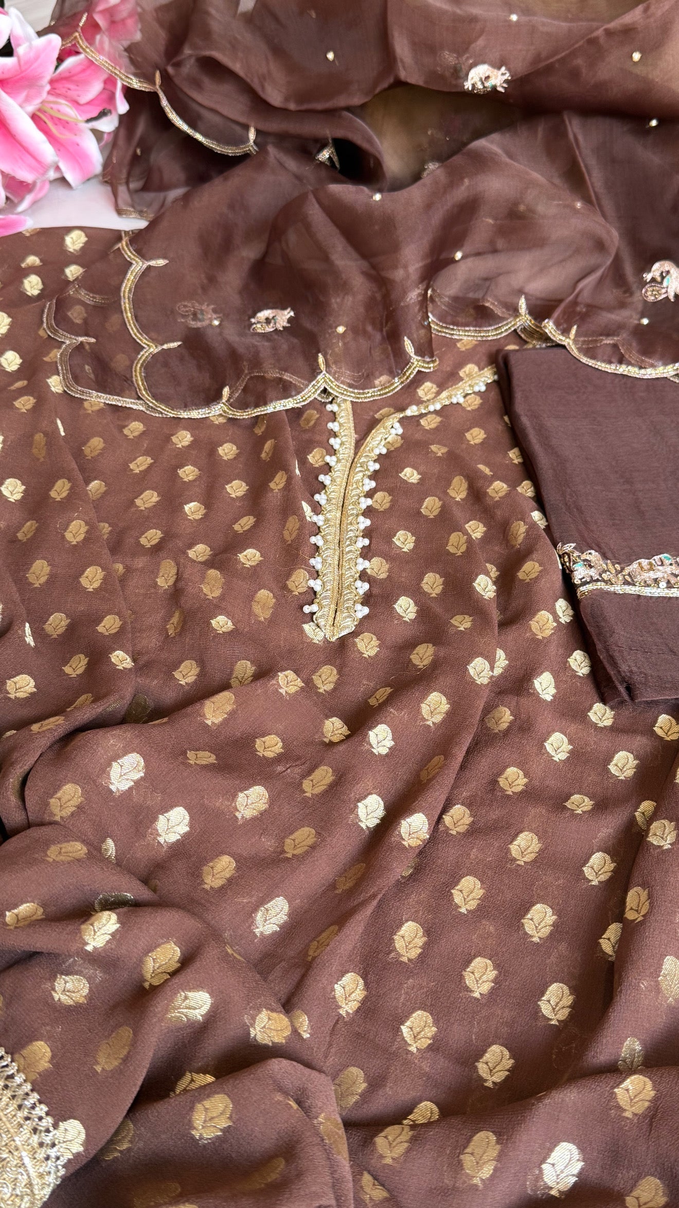 Choco brown banarasi gorgette kadhwa buti kurta paired with toy hathi motif hand embroidered scalloped kora duppata