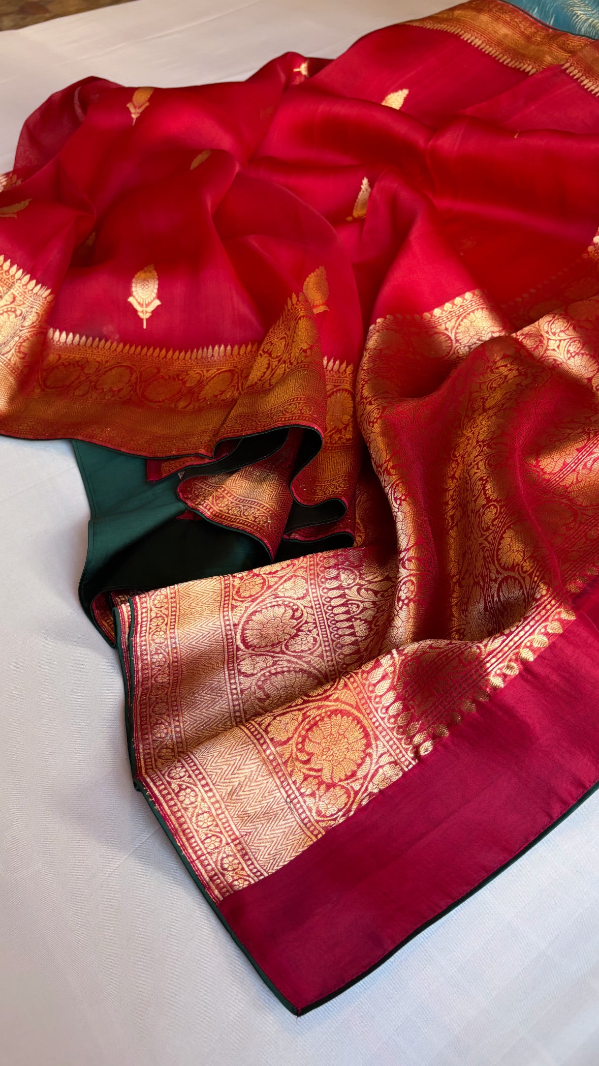 Sitara chilly red kora silk kadhwa buti saree with satin backing