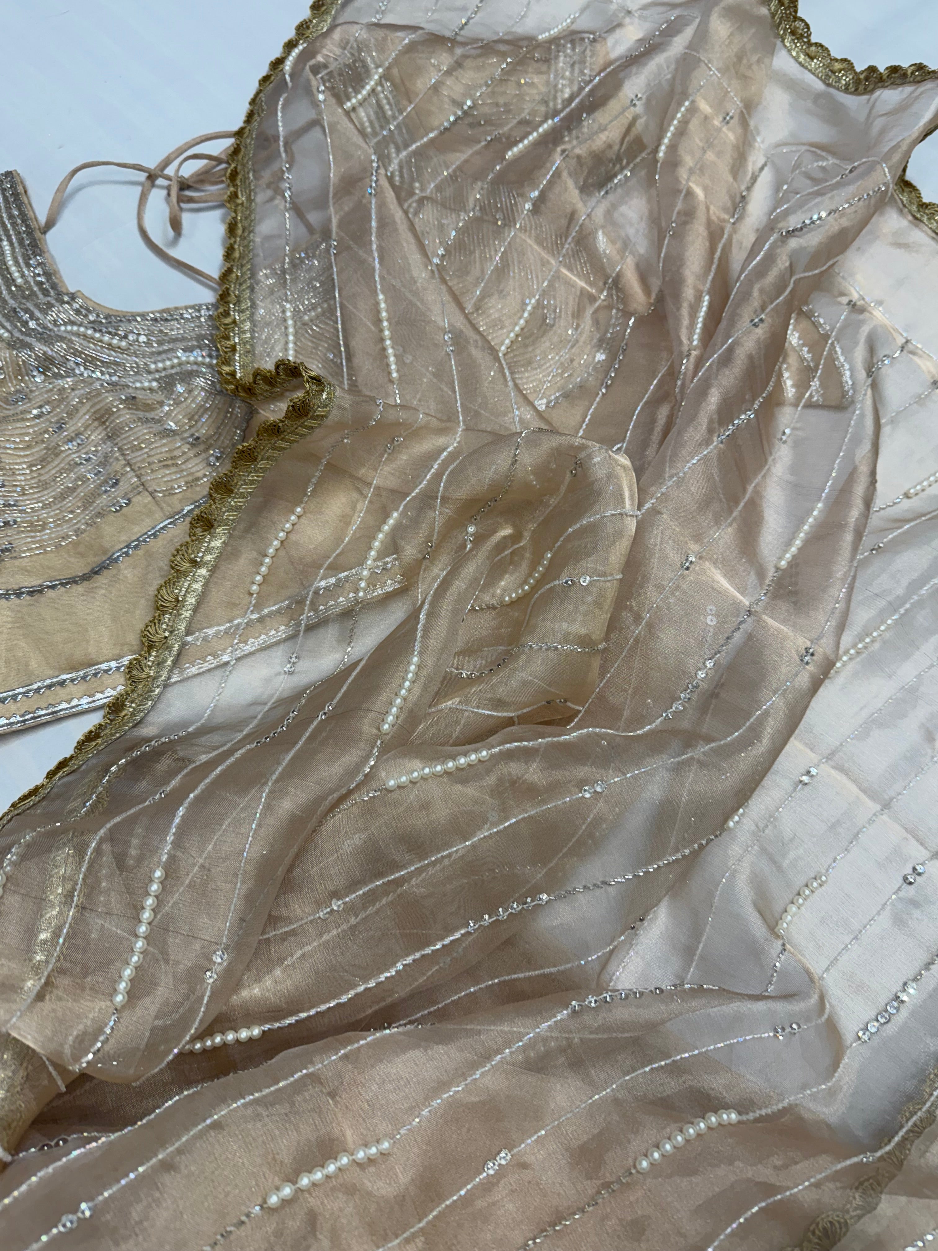 Suhana khan inspired golden pearl work heavy hand embroidered tissue silk saree