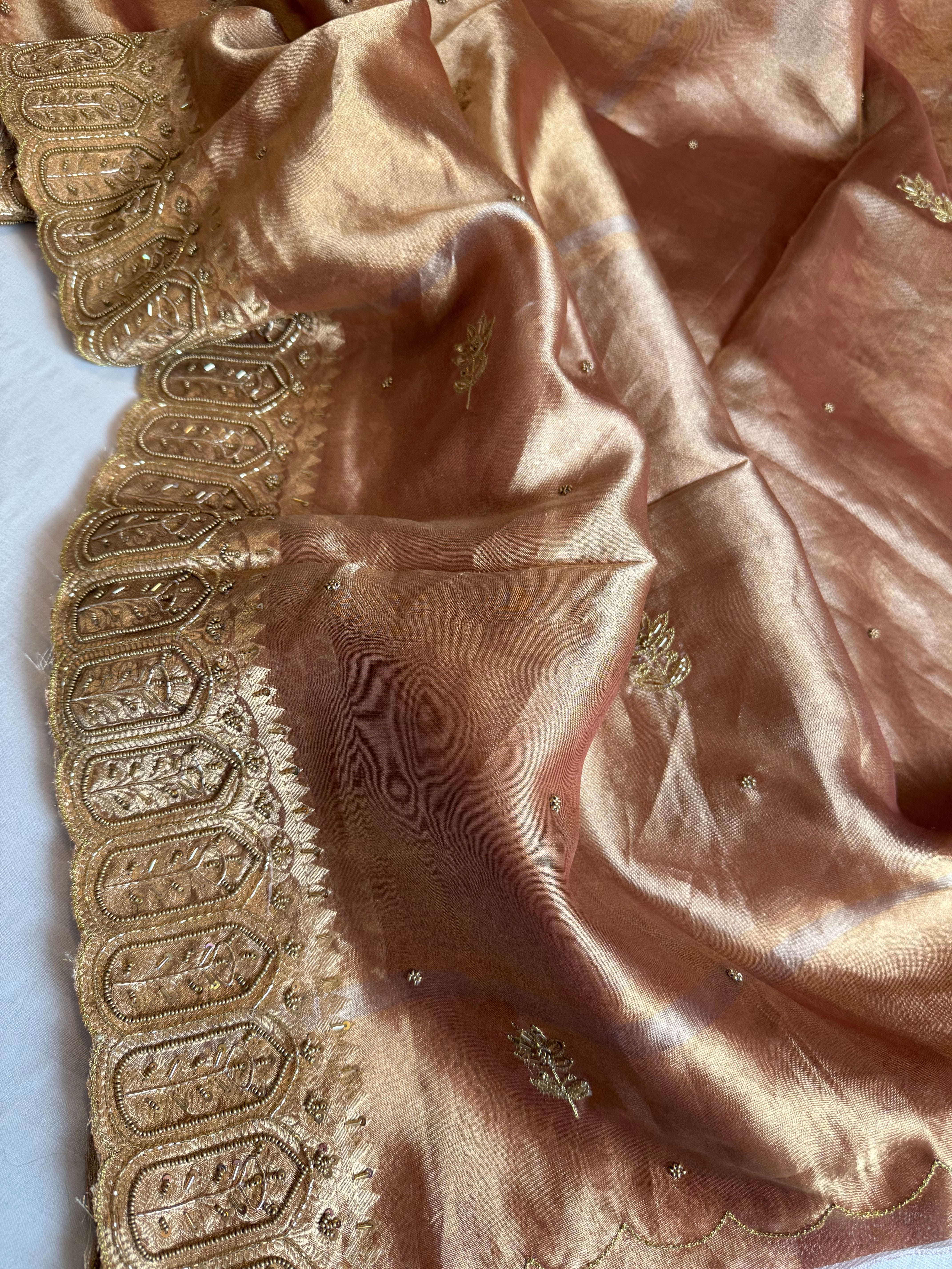 Husn kanjivaram peach tissue silk heavy hand embroidered saree