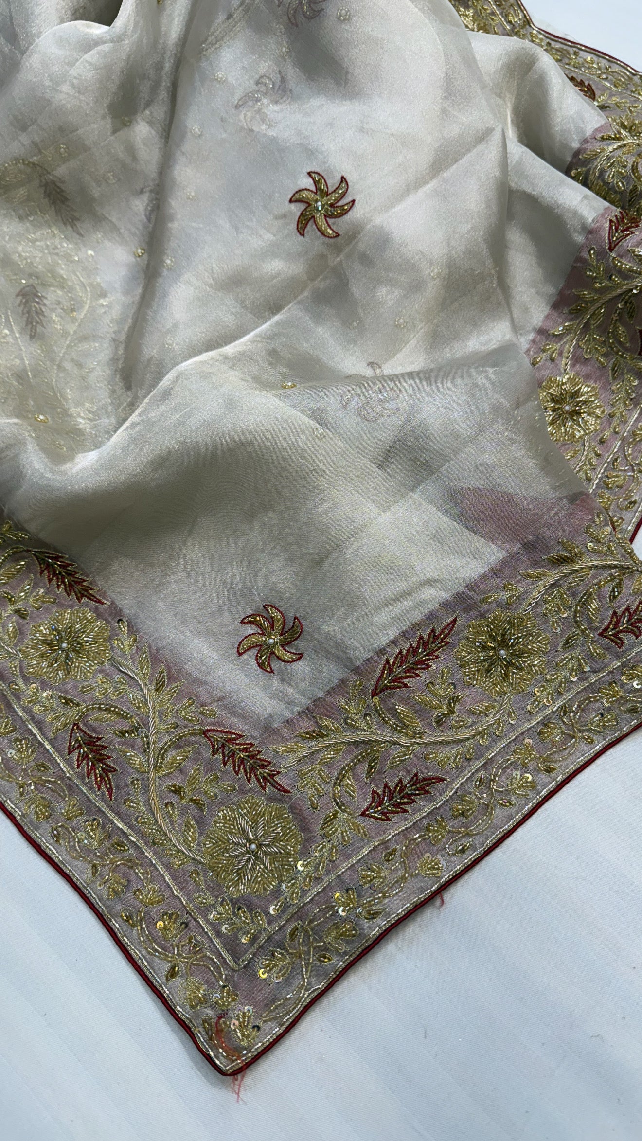 Gulab ki pankhuri husn tissue silk heavy hand embroidered zardozi border saree