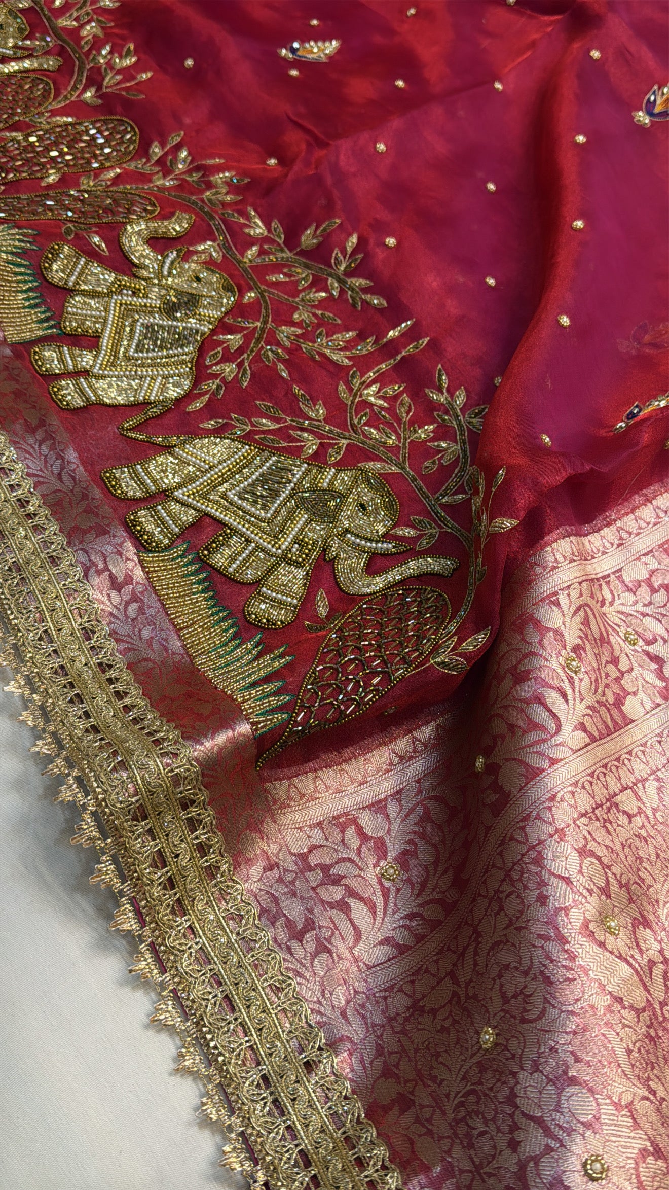 Dulhan ka joda husn red tissue silk hand embroidered saree