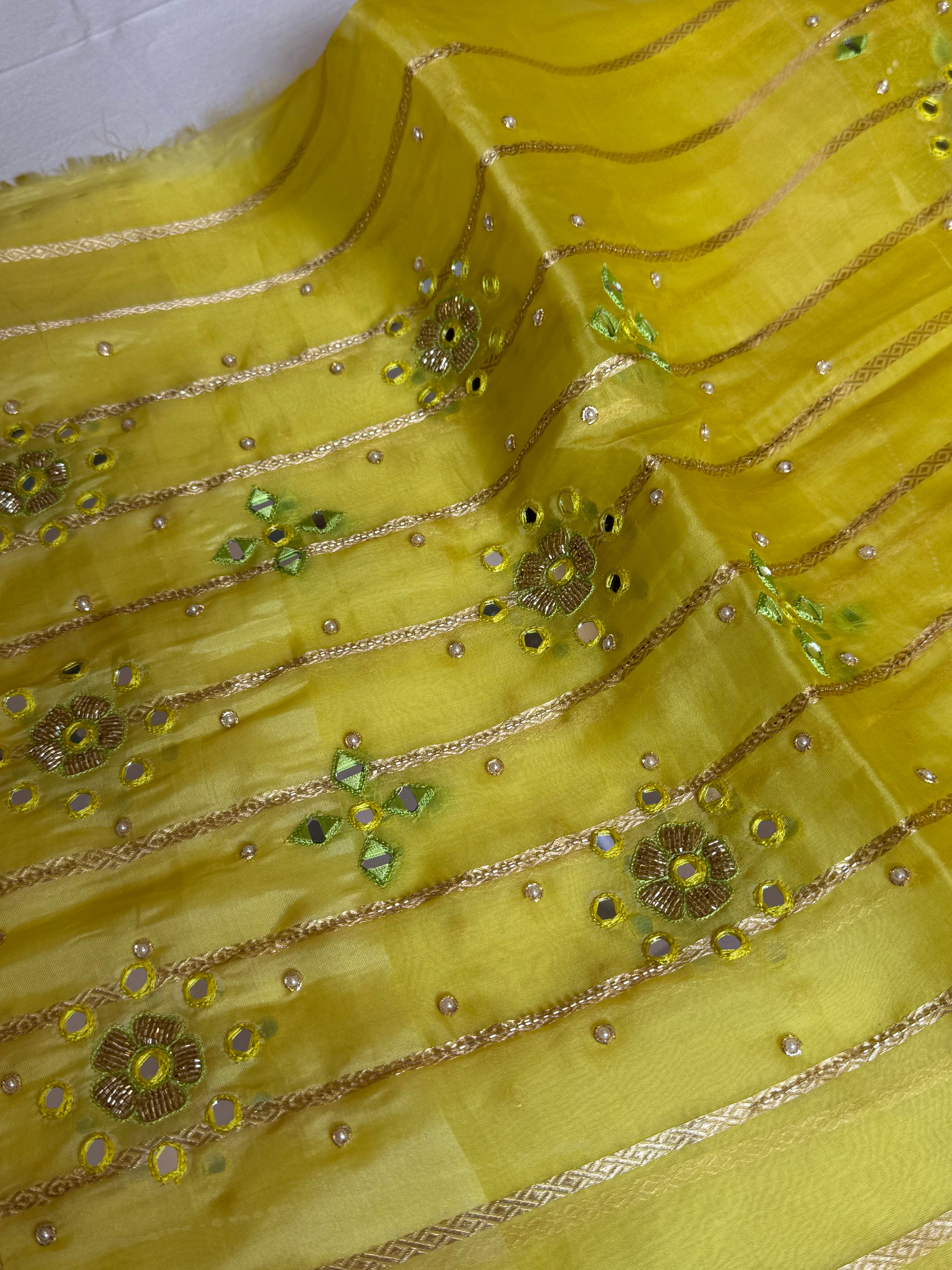 Lemon yellow banarasi kora silk hand embroidered saree