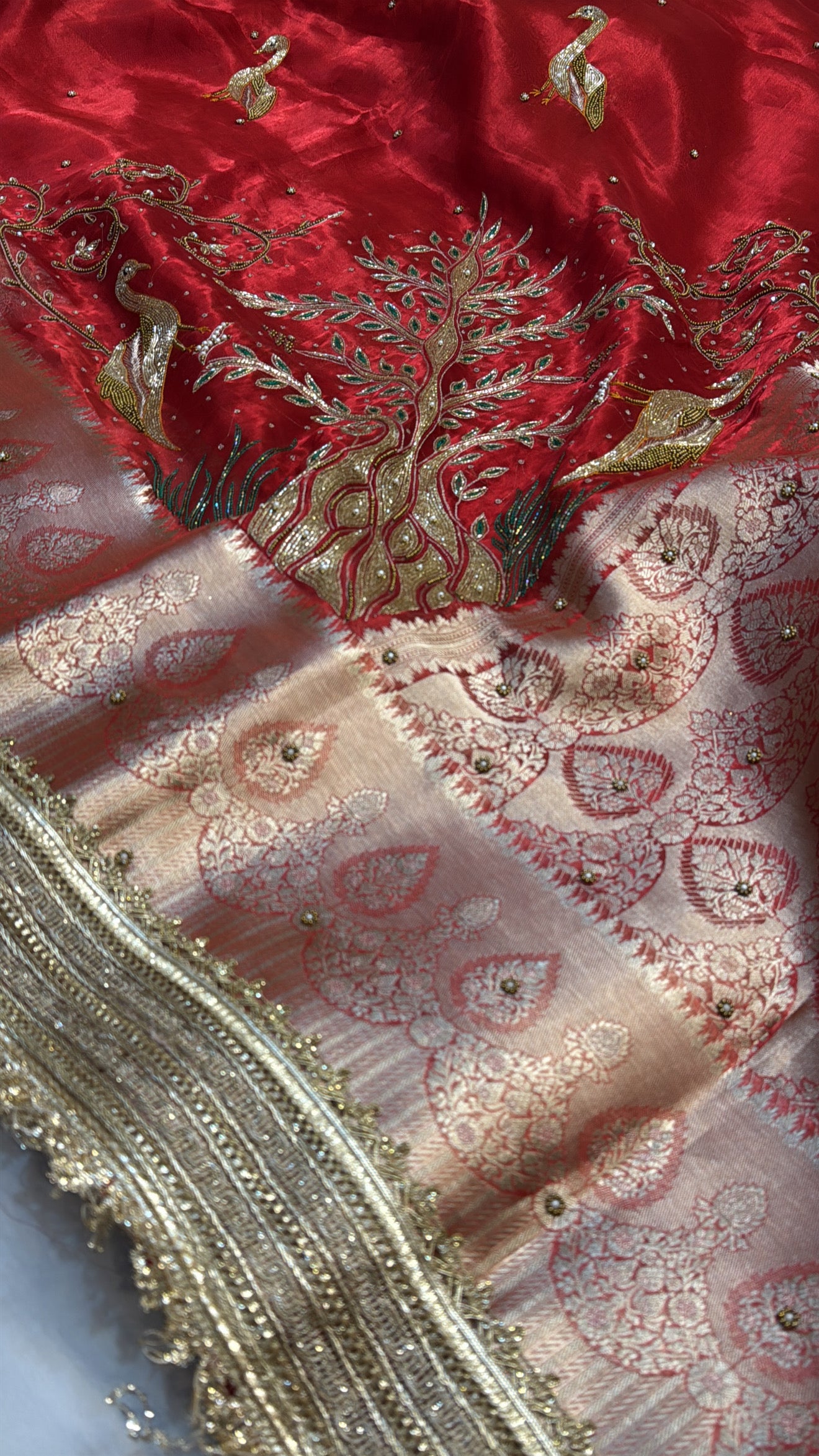 Dulhan ka joda husn red tissue silk hand embroidered saree