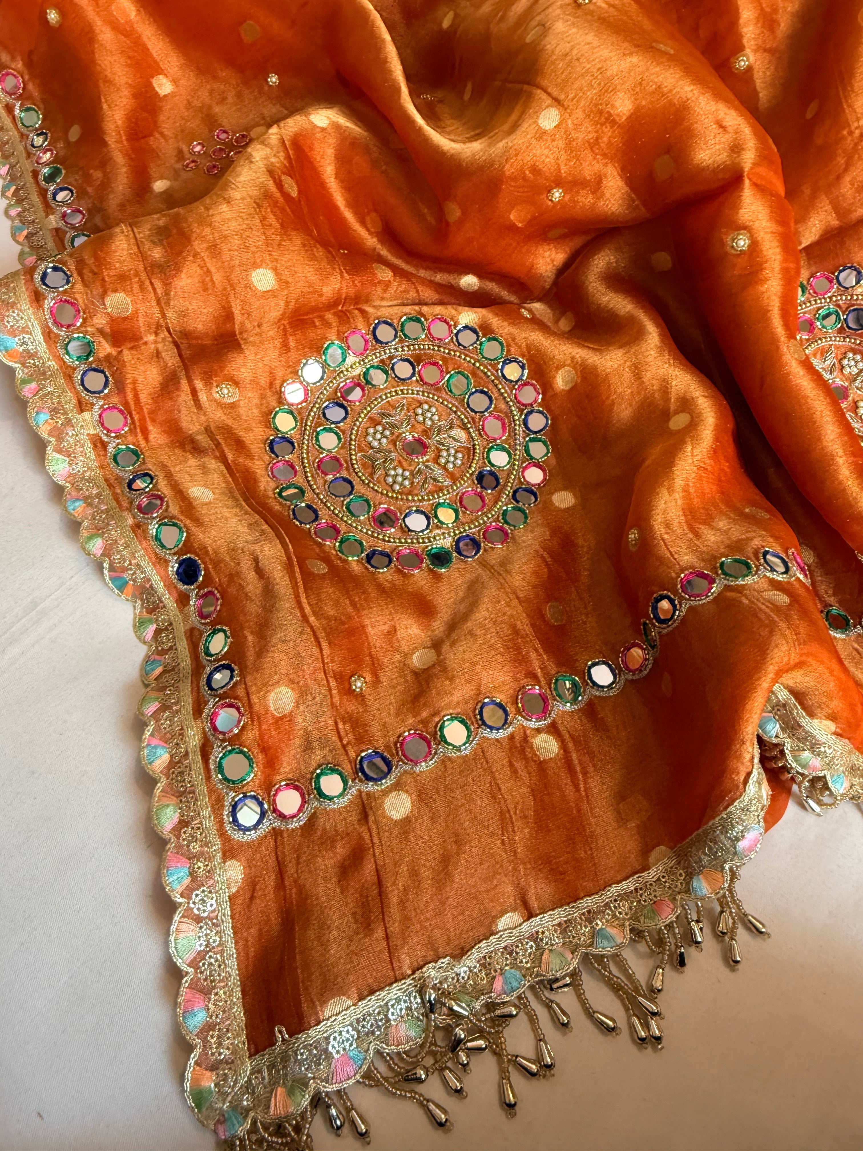 Fanta orange tissue silk meenakari mirror work hand embroidered saree