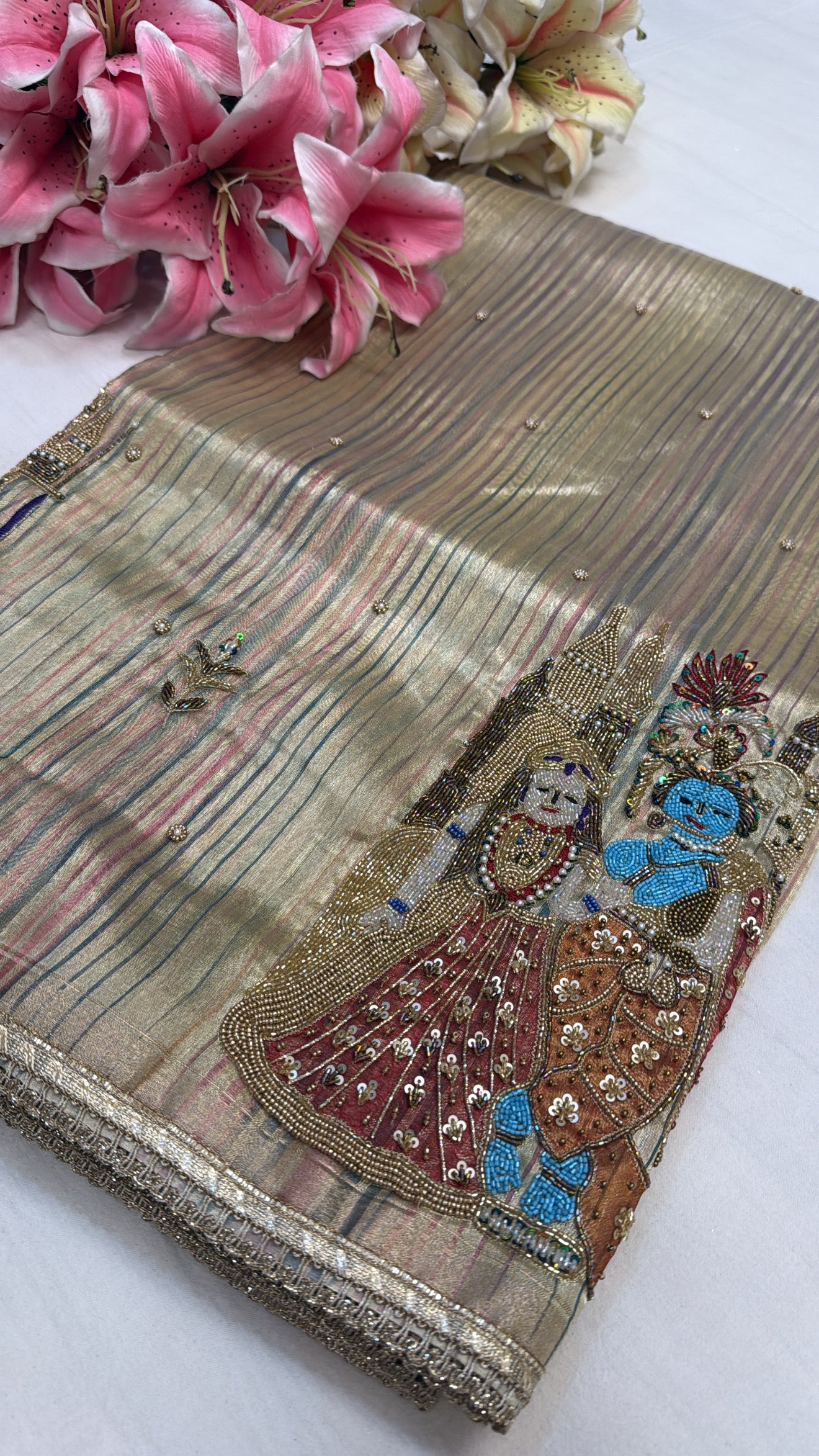 Rasleela tissue silk striped husn hand embroidered kadhwa saree