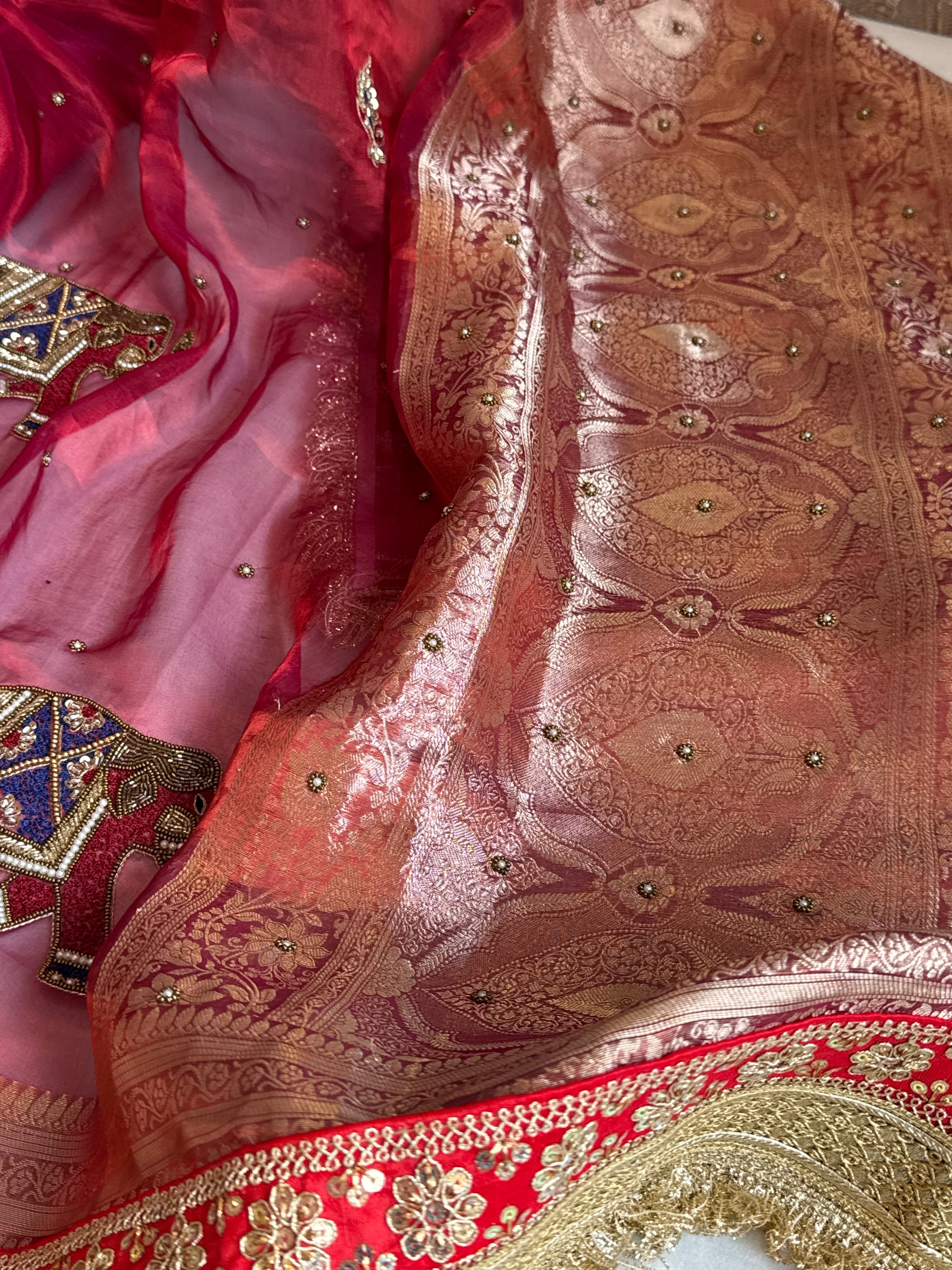 Elephant motif cranberry metallic red husn tissue silk hand embroidered saree
